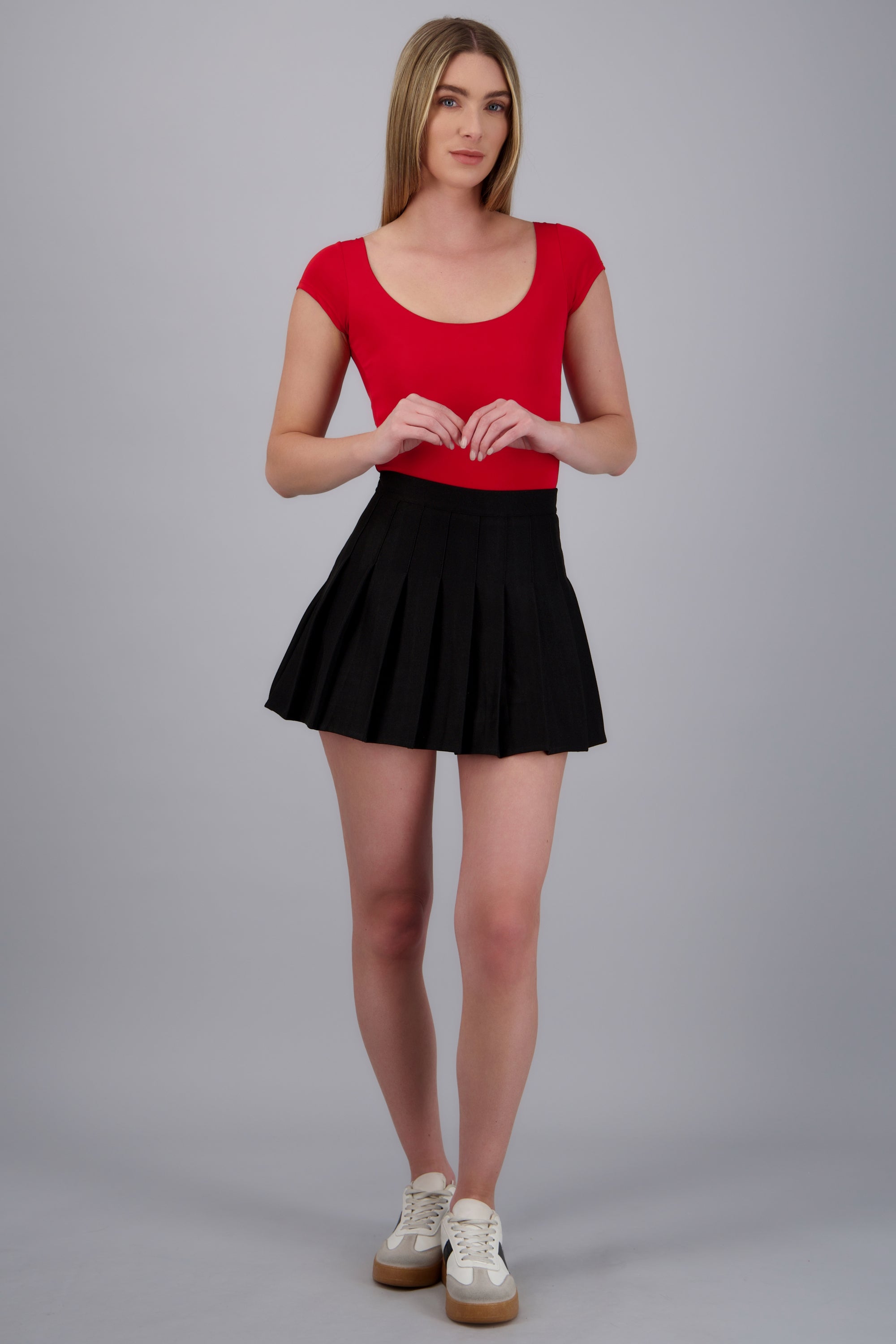 Mini falda tableada lisa NEGRO