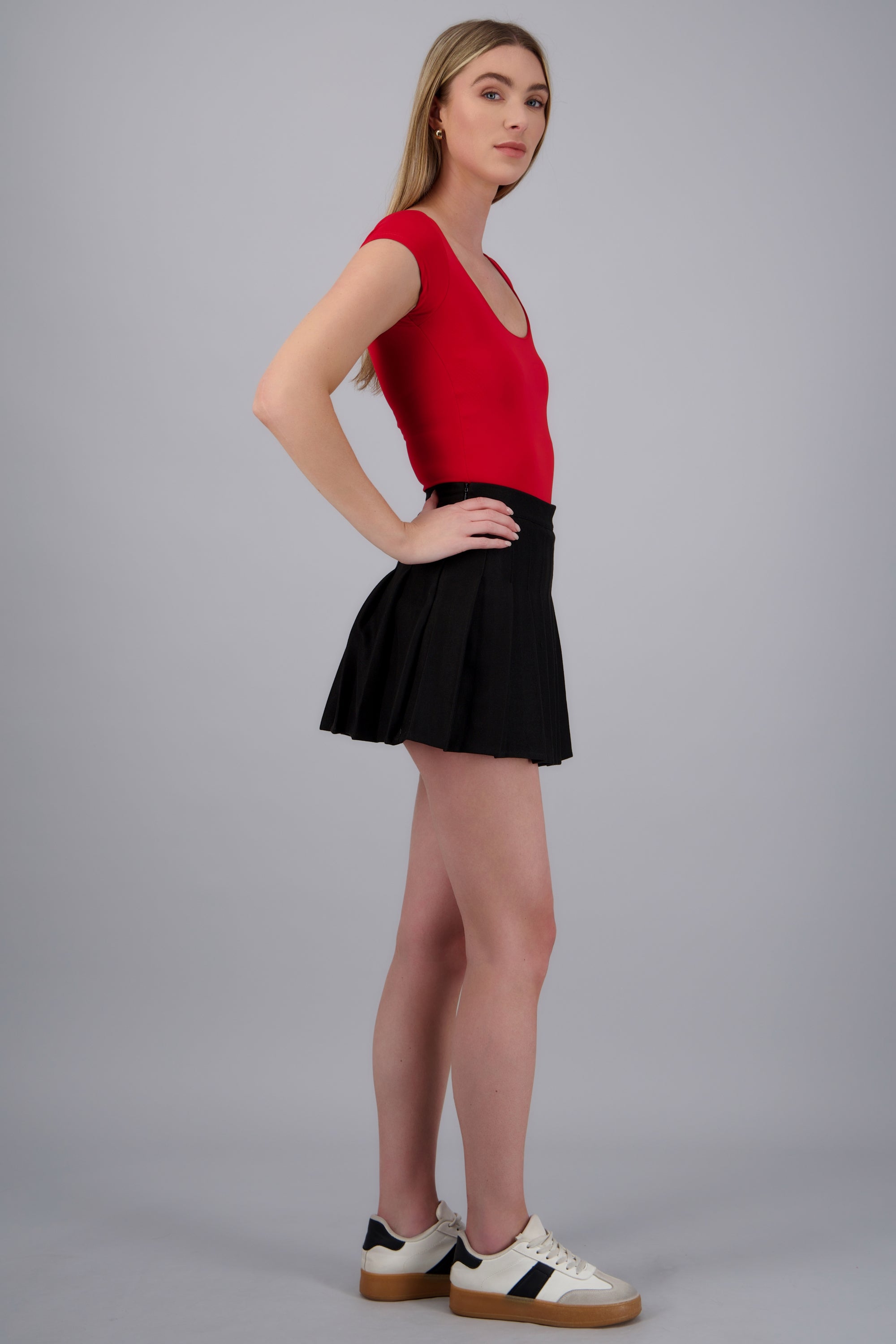 Mini falda tableada lisa NEGRO