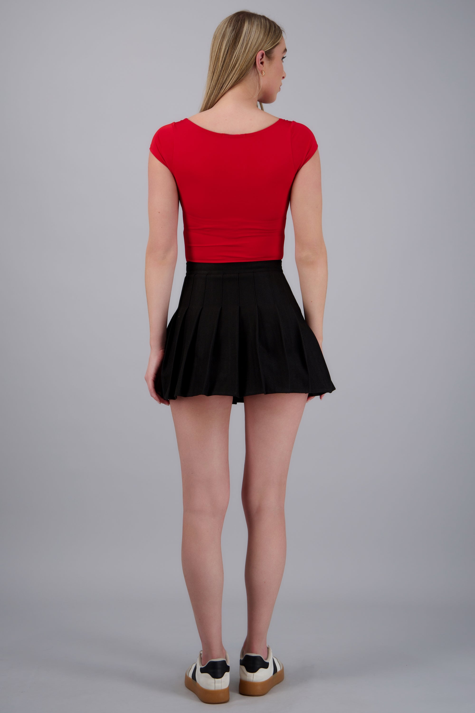 Mini falda tableada lisa NEGRO