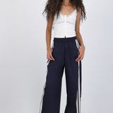 Pantalon rayas en costados