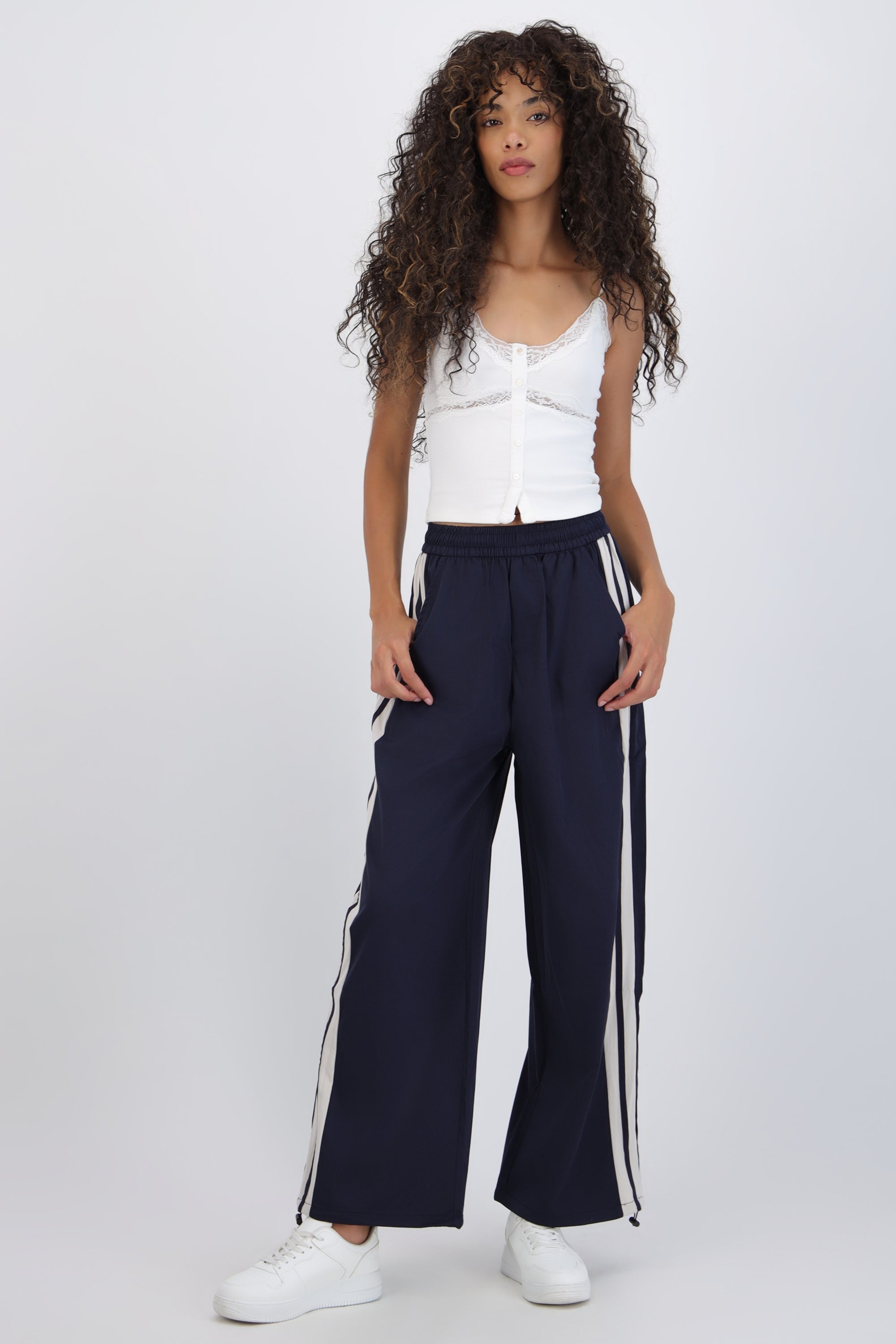 Pantalon rayas en costados