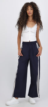 Pantalon rayas en costados