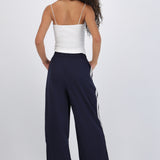 Pantalon rayas en costados