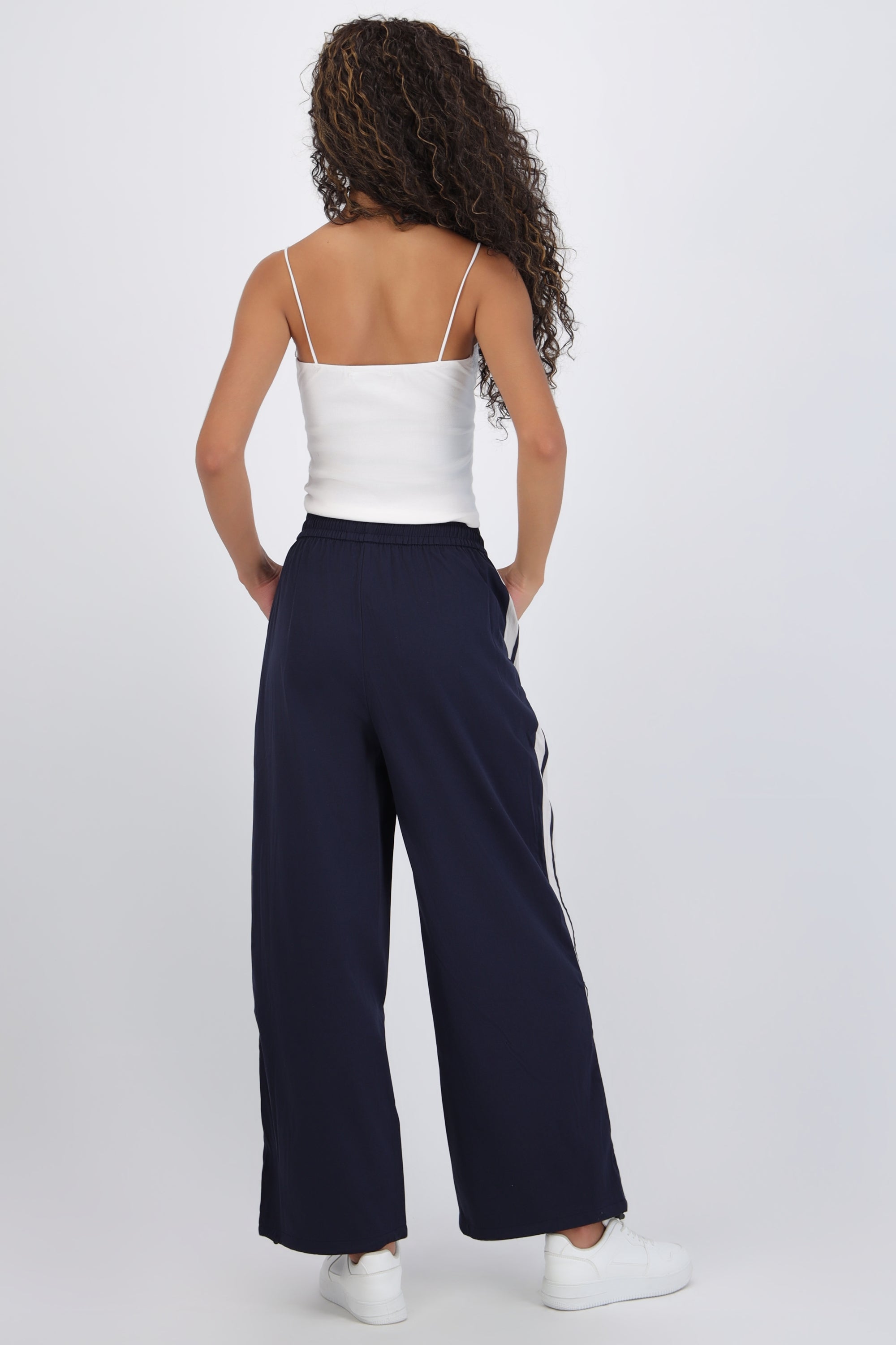 Pantalon rayas en costados