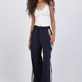 Pantalon rayas en costados