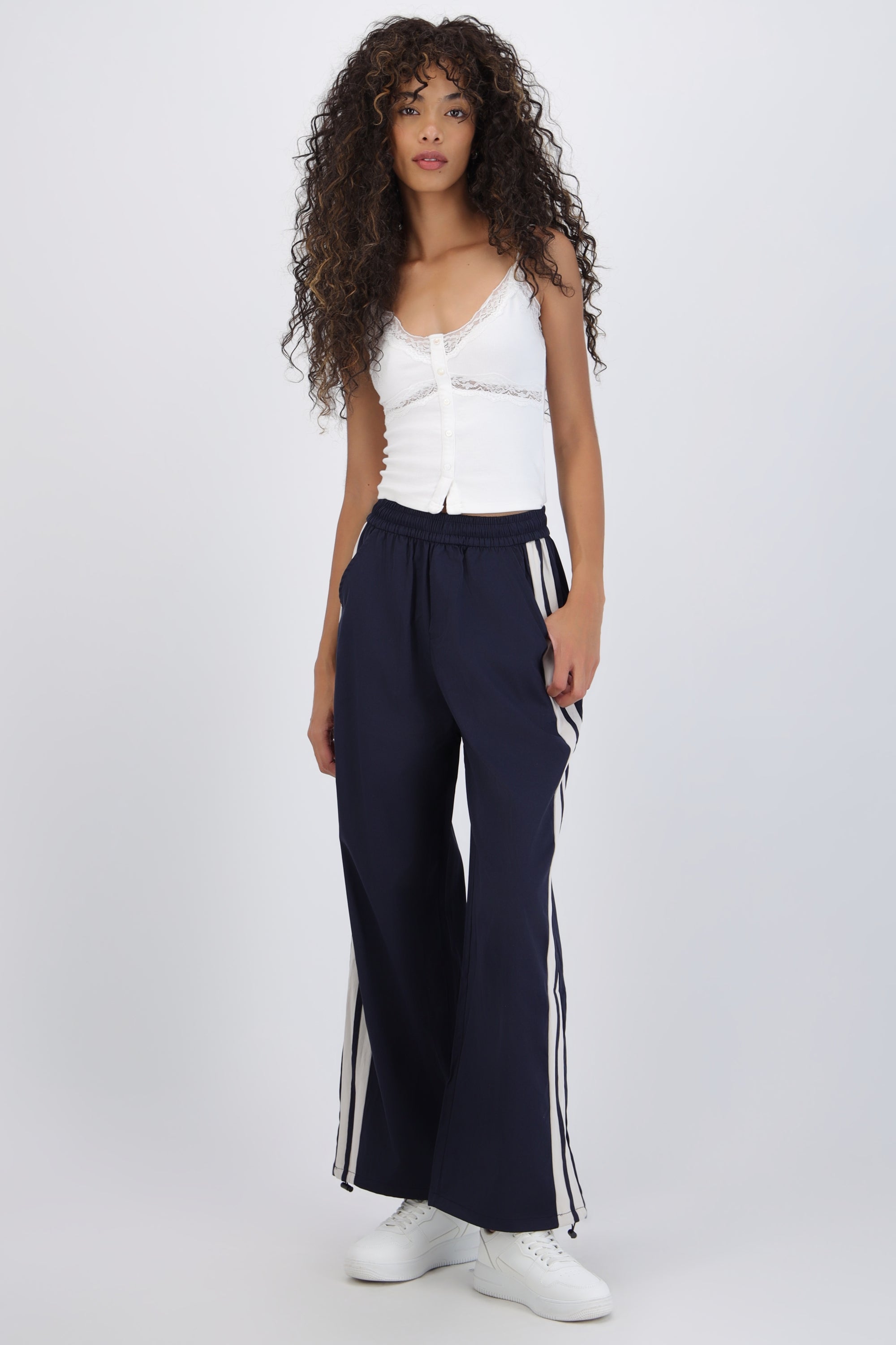Pantalon rayas en costados