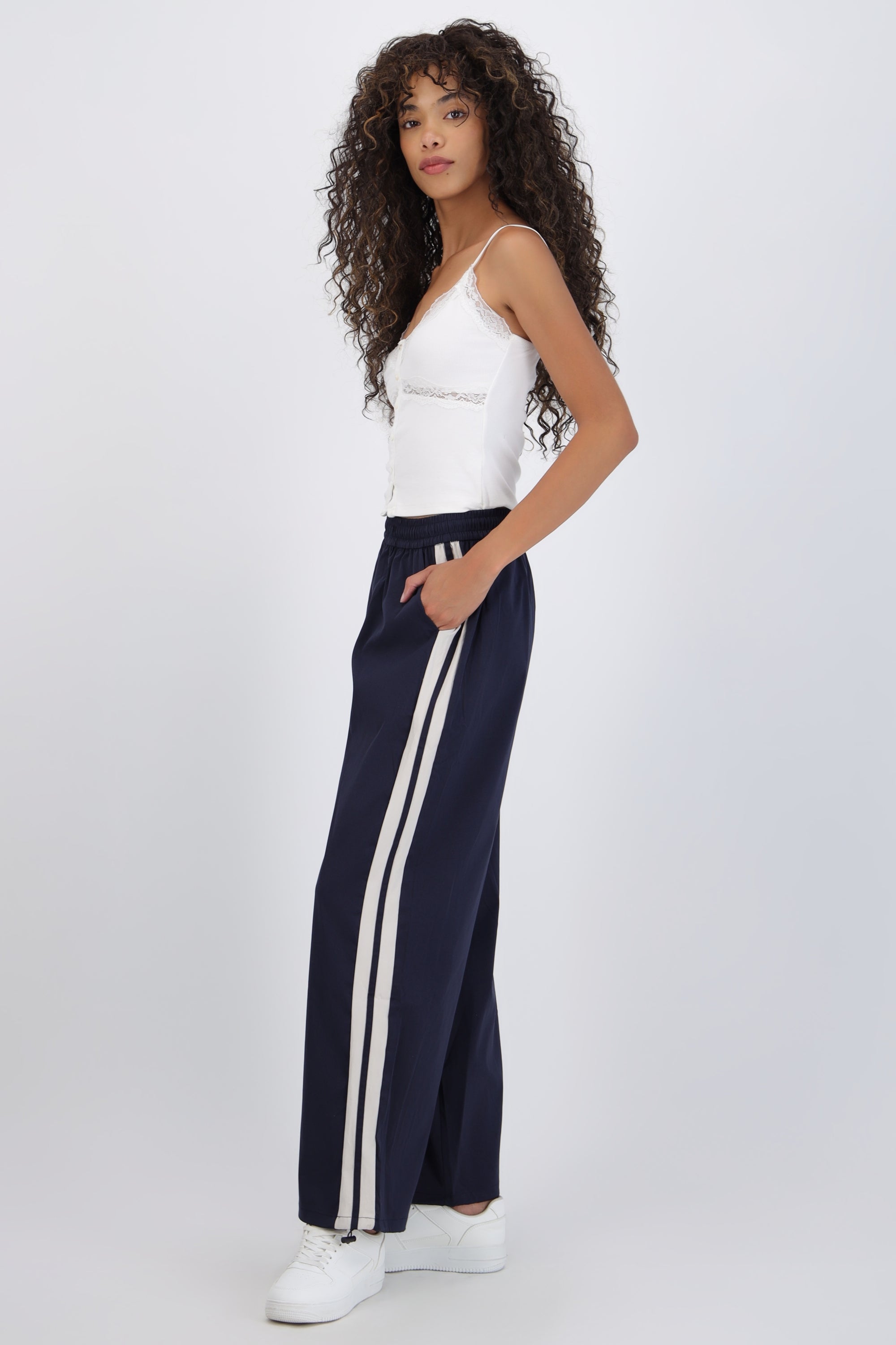 Pantalon rayas en costados