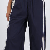 Pantalon rayas en costados