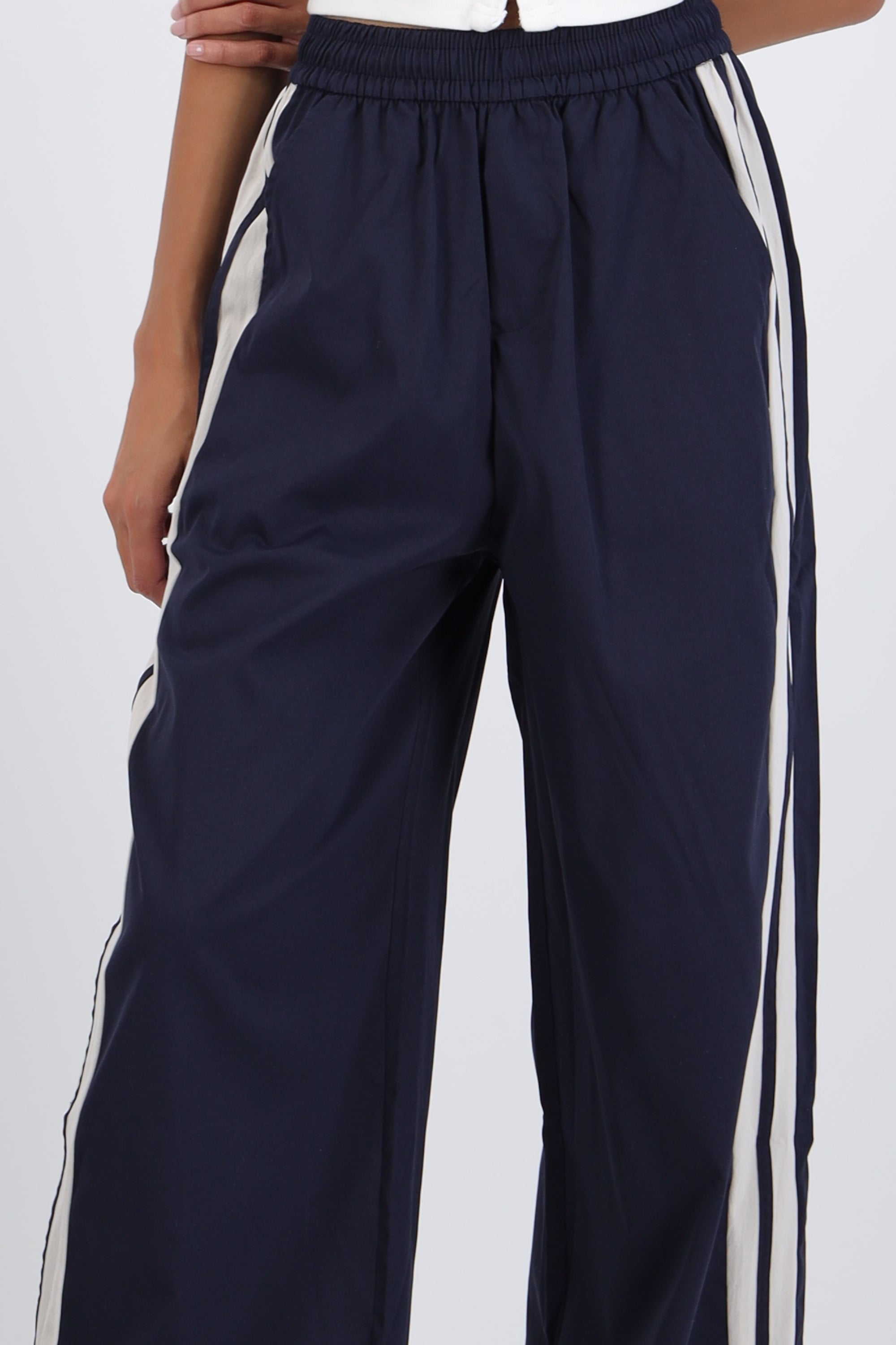 Pantalon rayas en costados