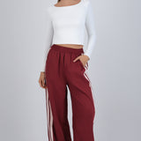 Pantalon rayas en costados