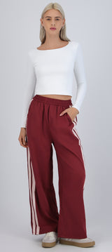 Pantalon rayas en costados