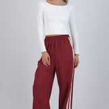 Pantalon rayas en costados