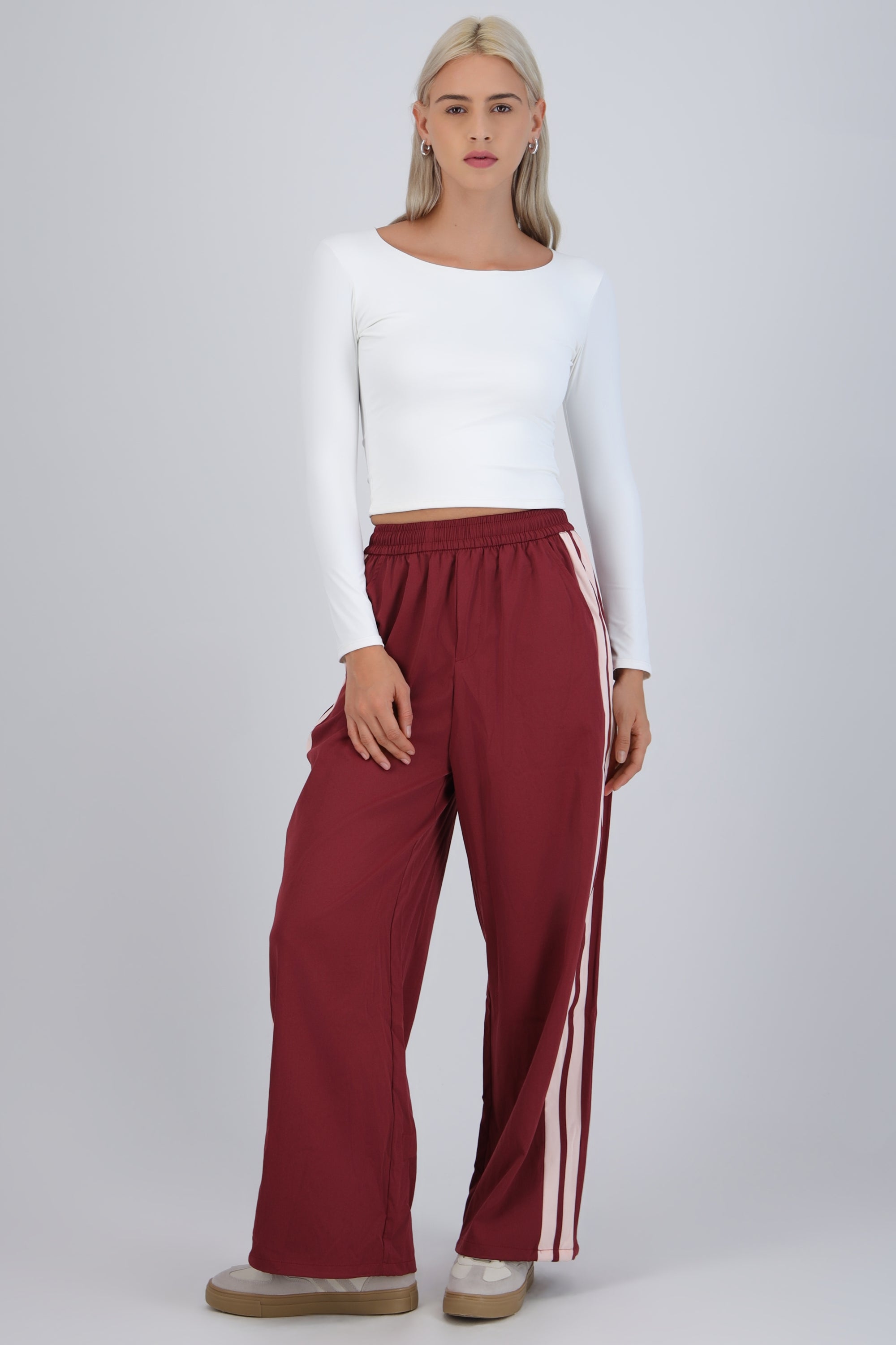 Pantalon rayas en costados