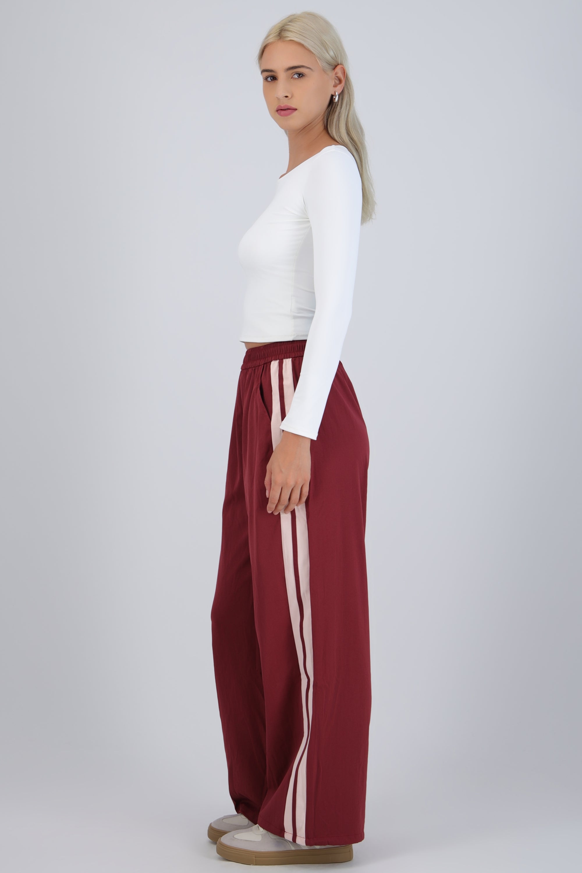 Pantalon rayas en costados