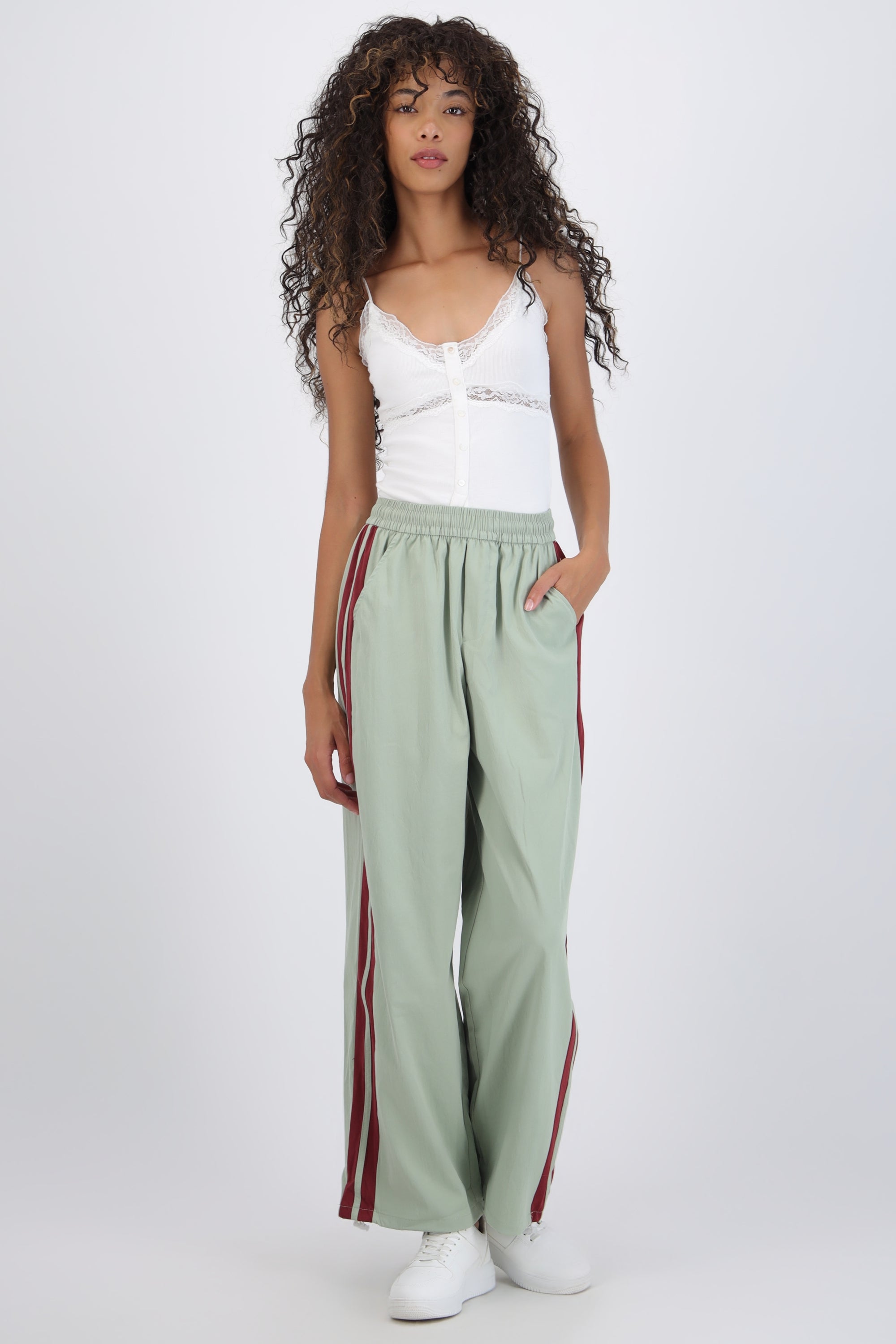 Pantalon rayas en costados