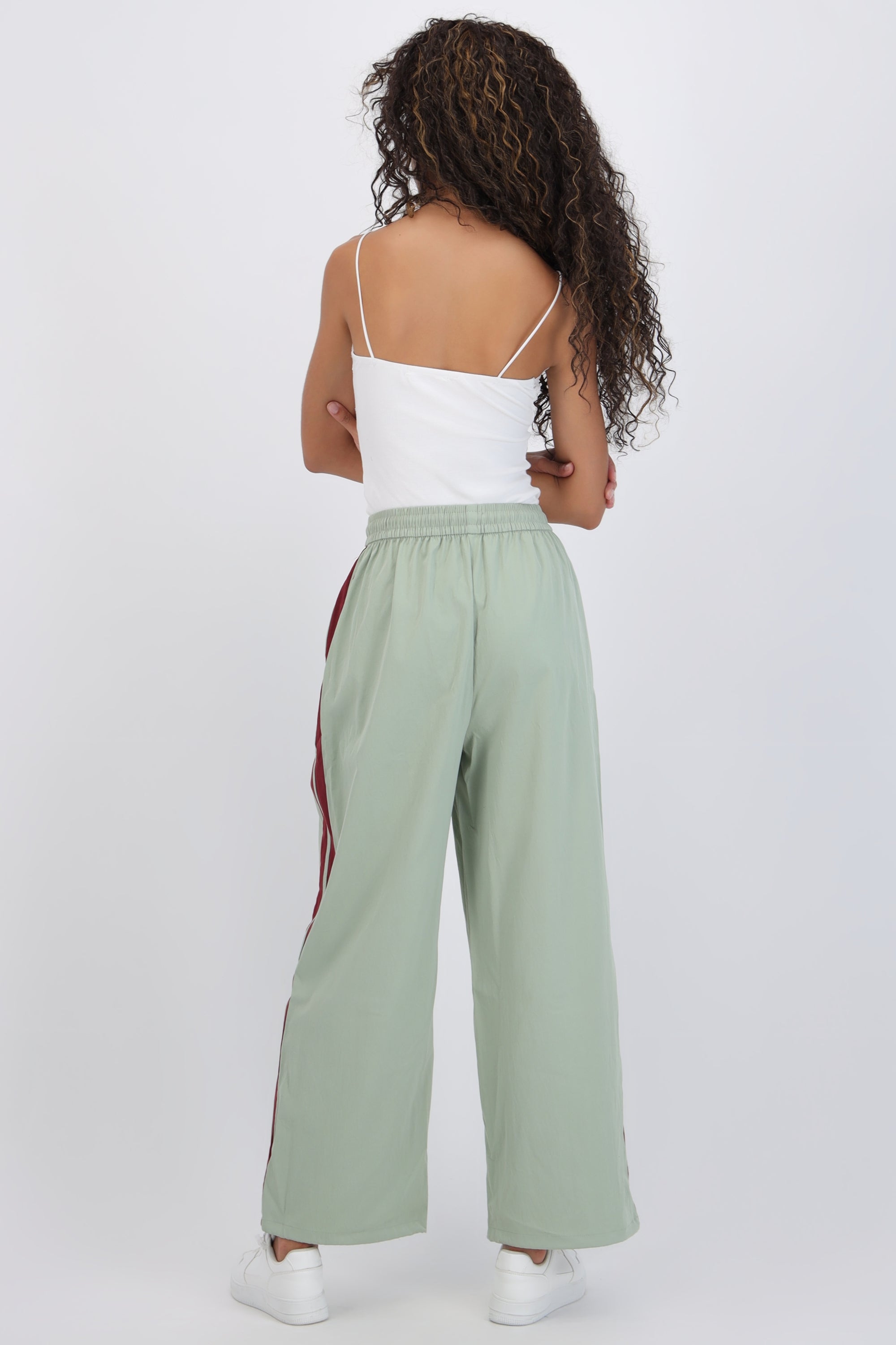 Pantalon rayas en costados