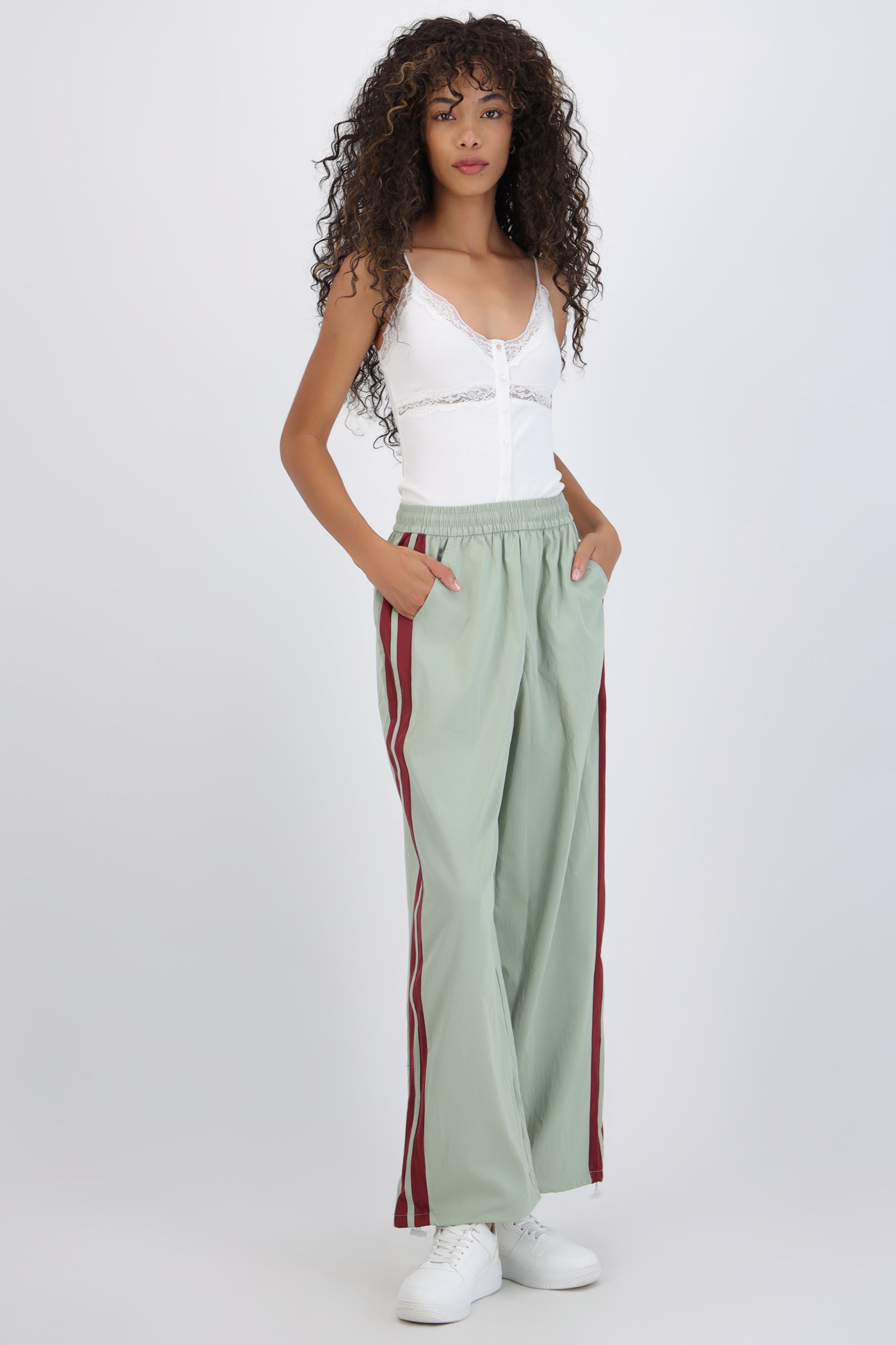 Pantalon rayas en costados
