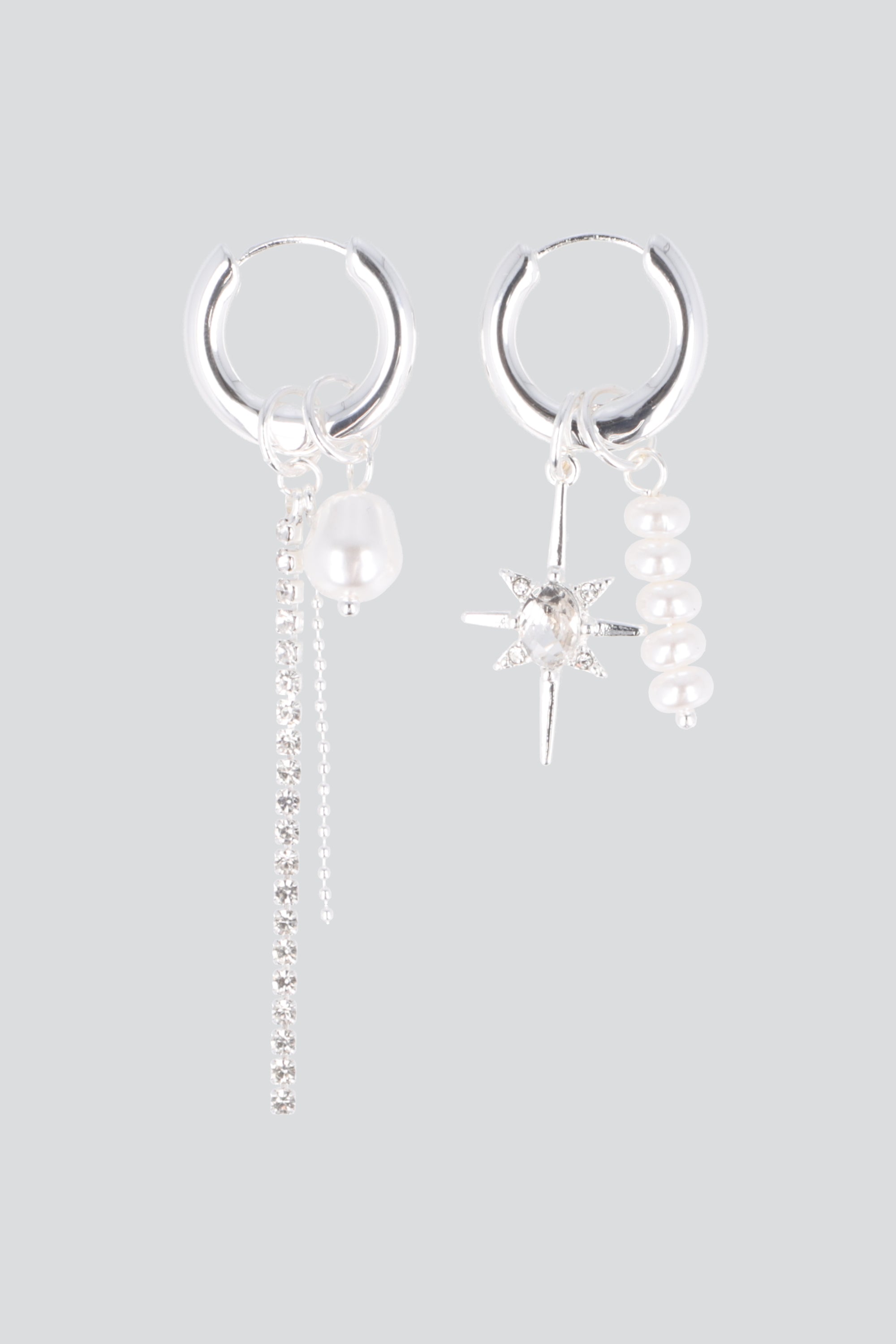 ARETES ASIMETRICOS ESTRELLA PQ PLATA