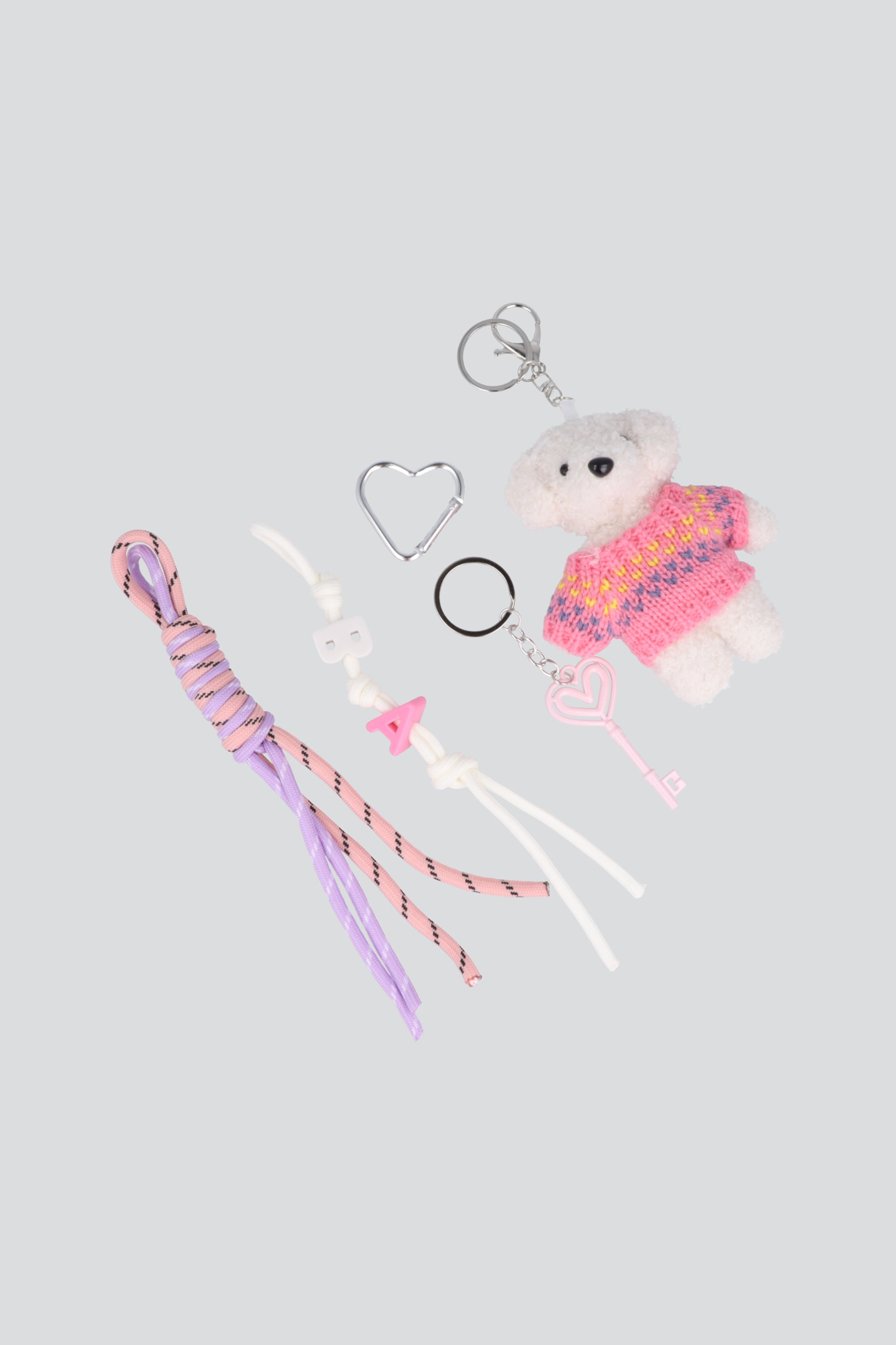Llavero multicharm oso con sueter BEIGE