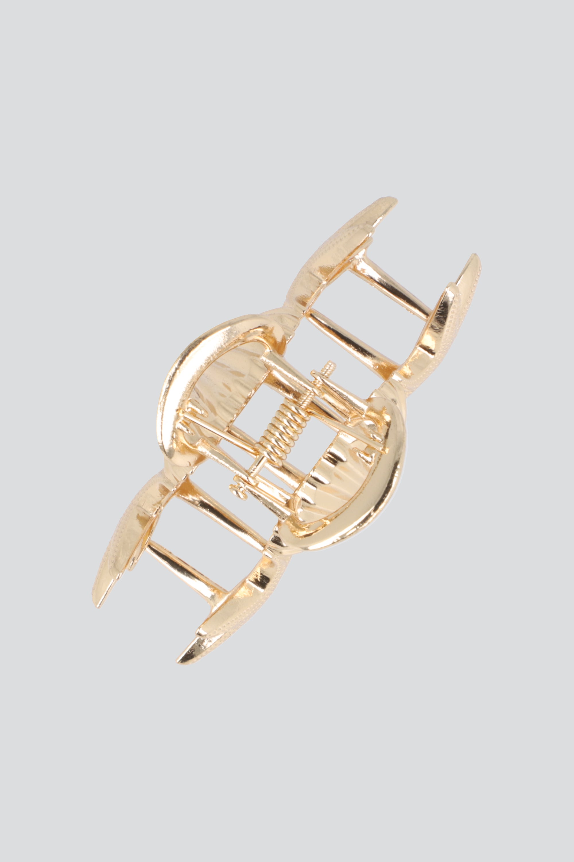 PINZA ESTRELLAS CONCHA METAL ORO