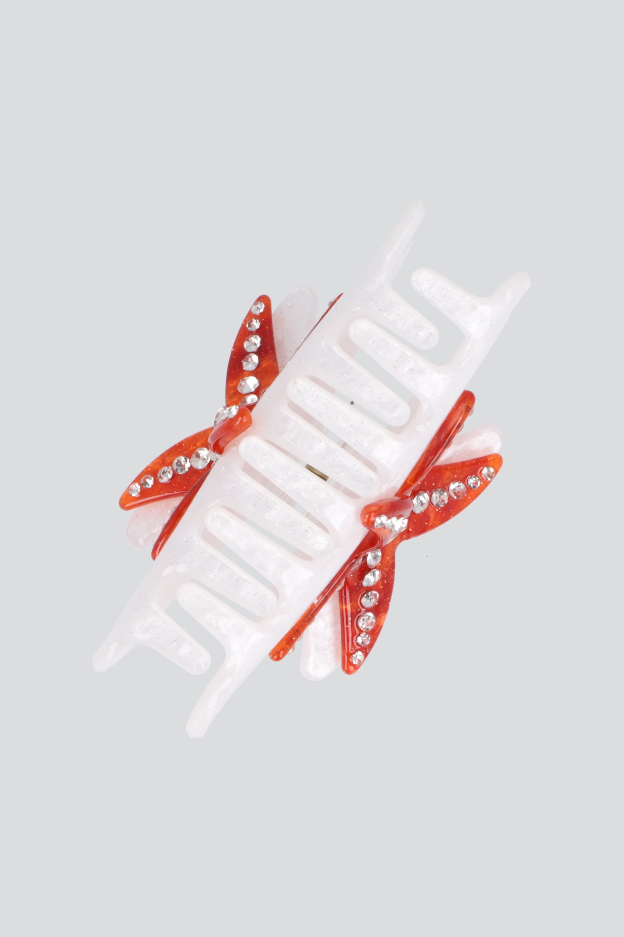 PINZA ESTRELLA DE MAR BRILLOS BLANCO