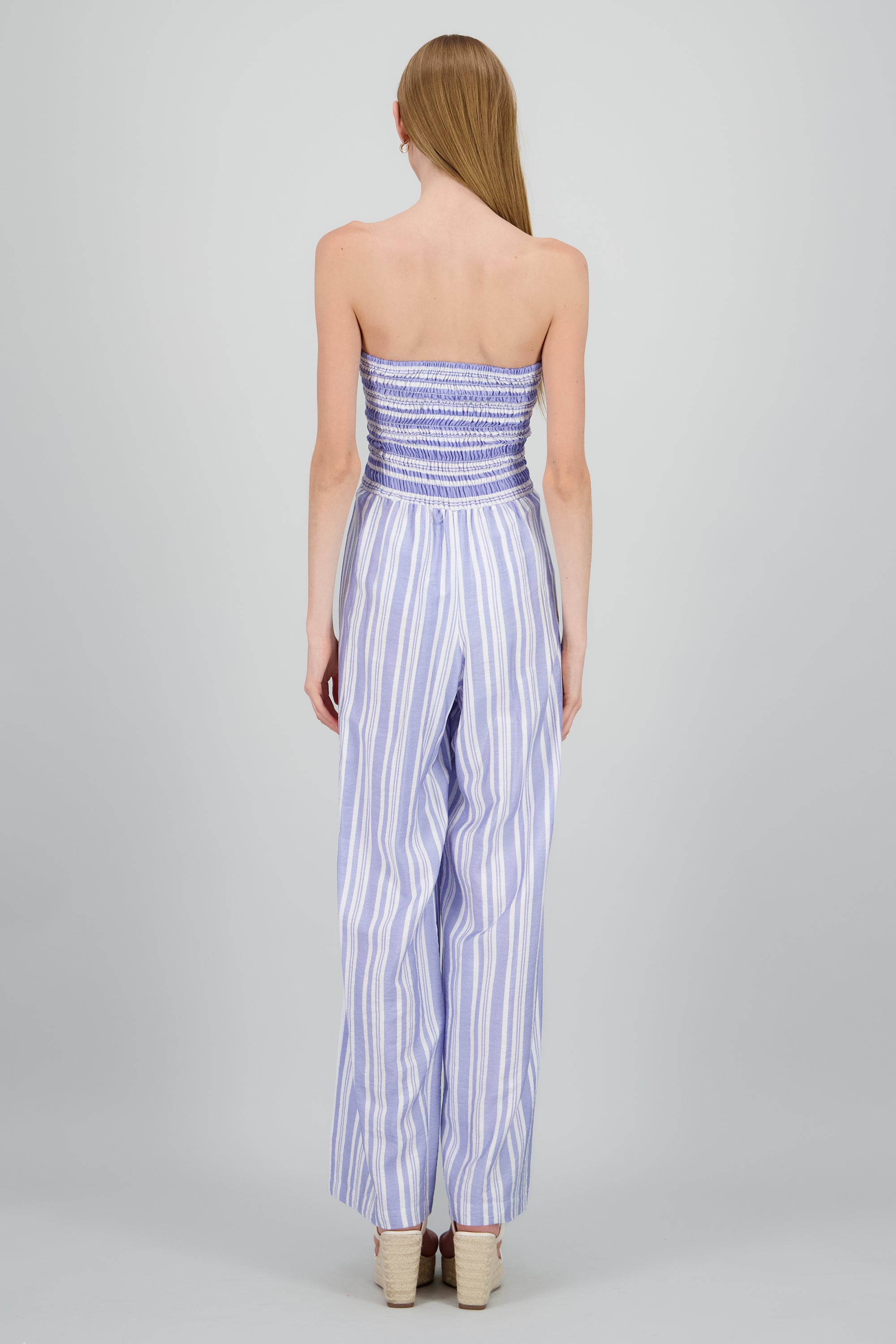 Jumpsuit strapless detalle smock moño AZUL COMBO