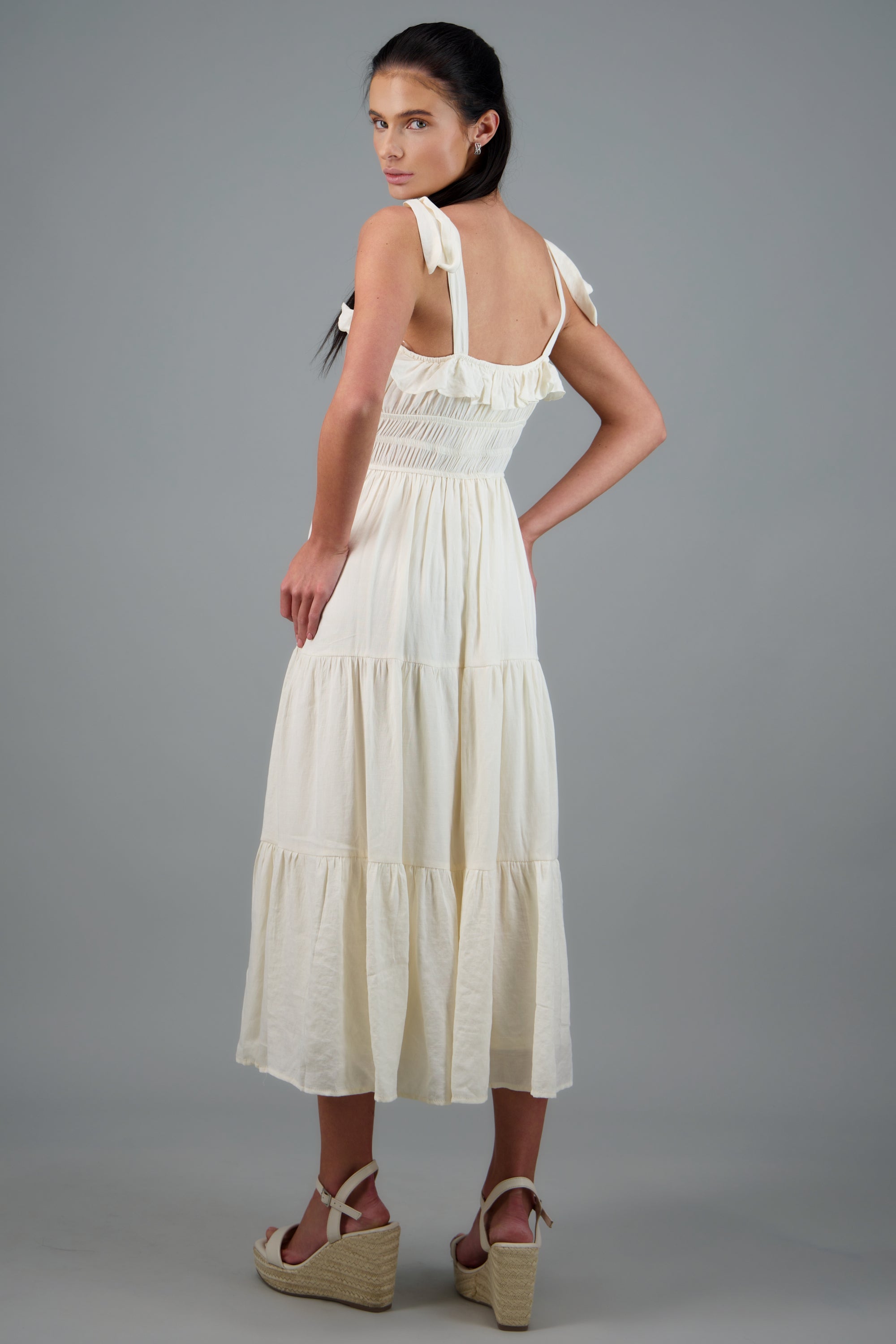 Vestido maxi liso detalle tirantes moños CREMA