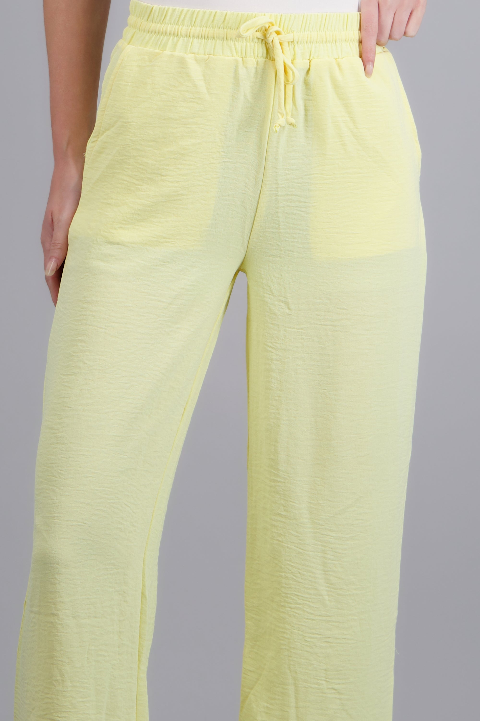 Pantalones lisos con jareta CREMA