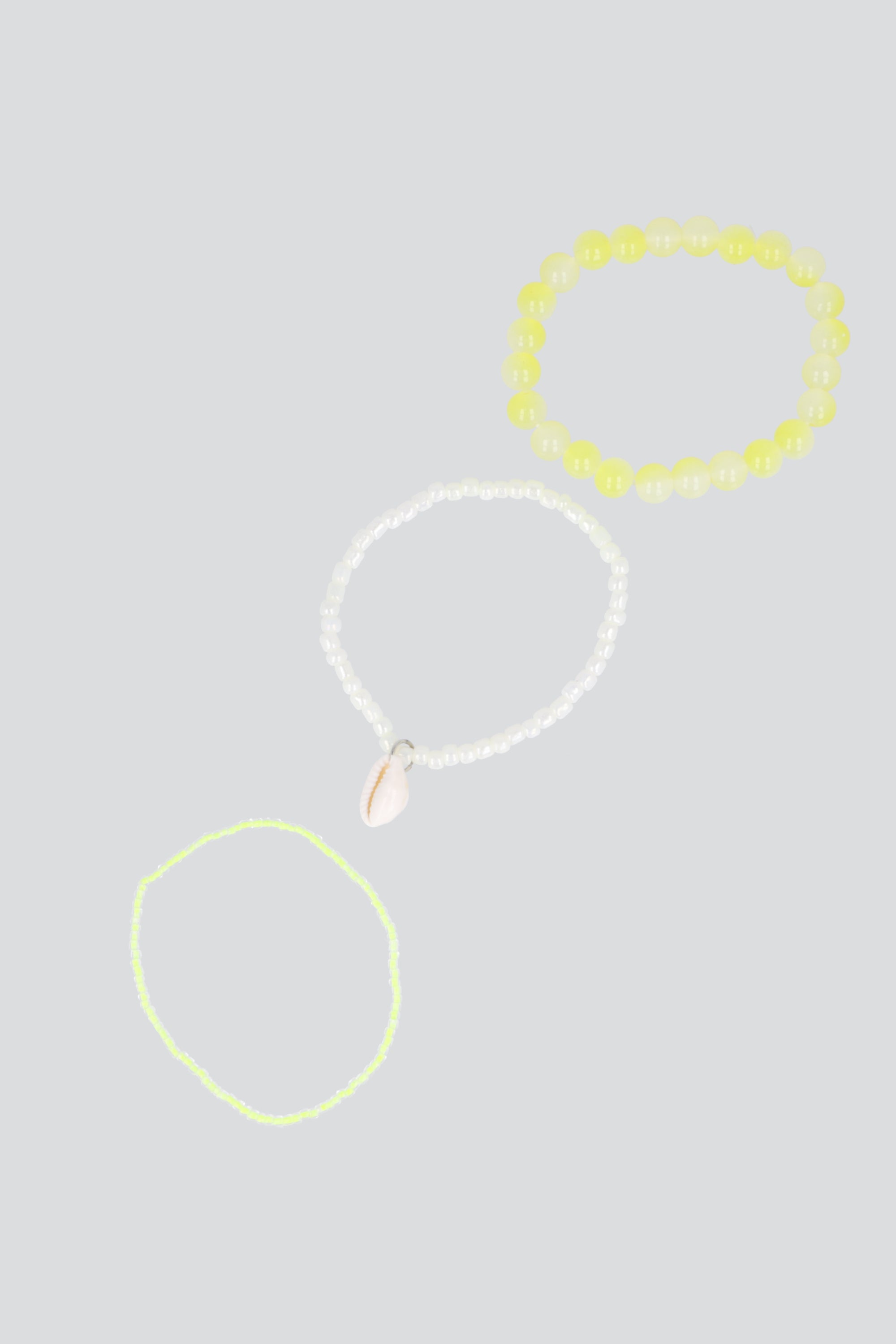 3 PULSERAS BEADS CONCHA AMARILLO