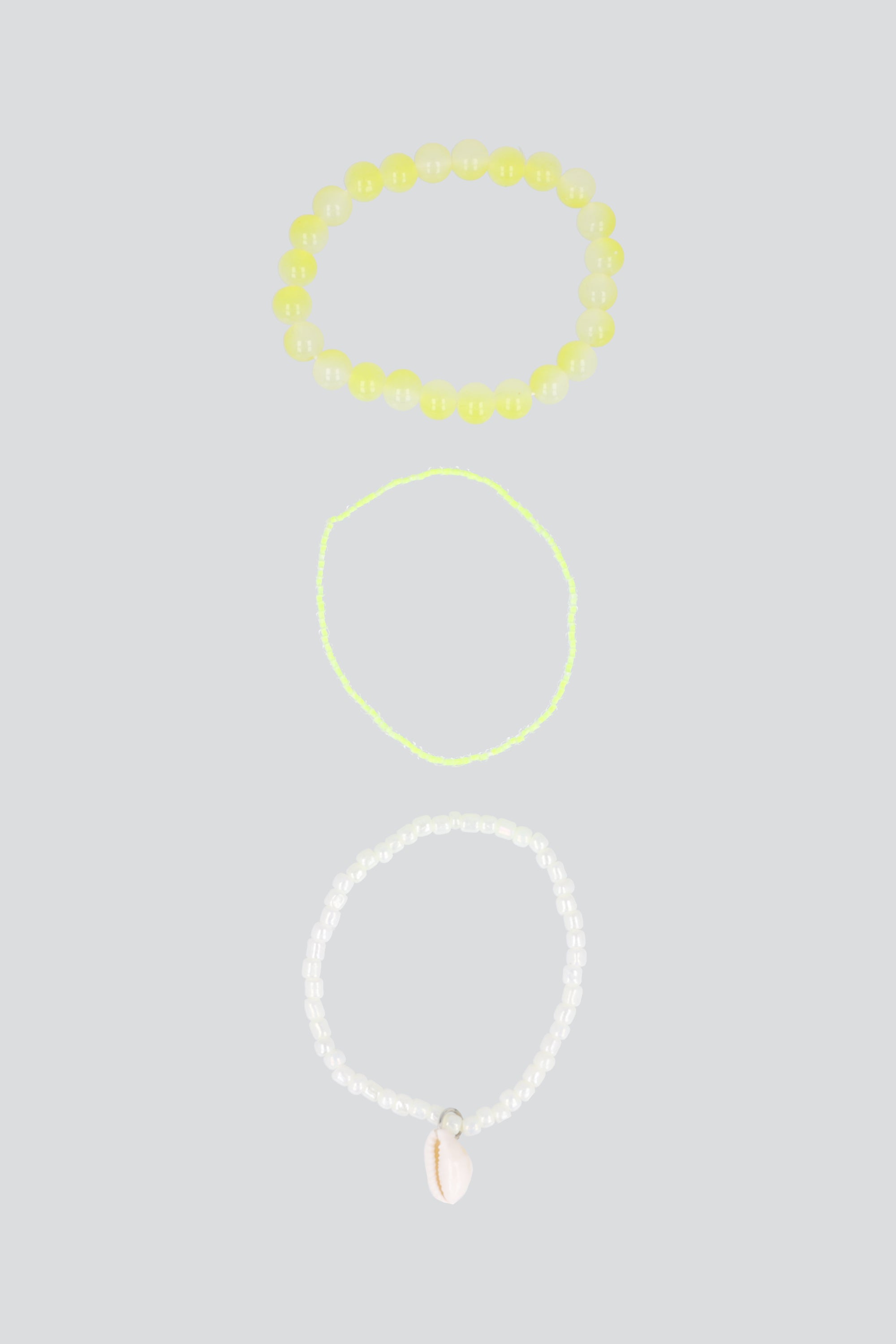 3 PULSERAS BEADS CONCHA AMARILLO