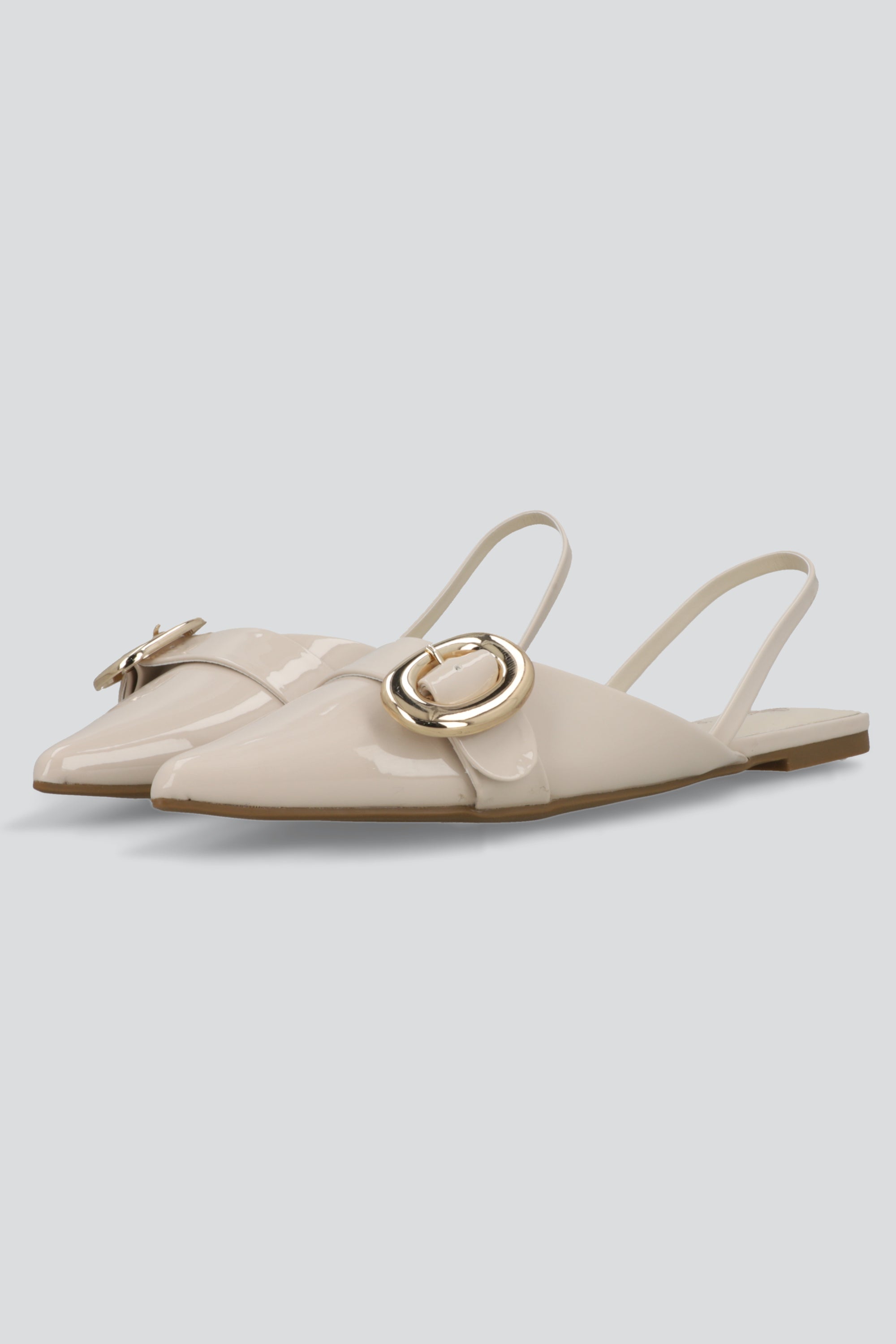 Flat slingback hebilla circular HUESO