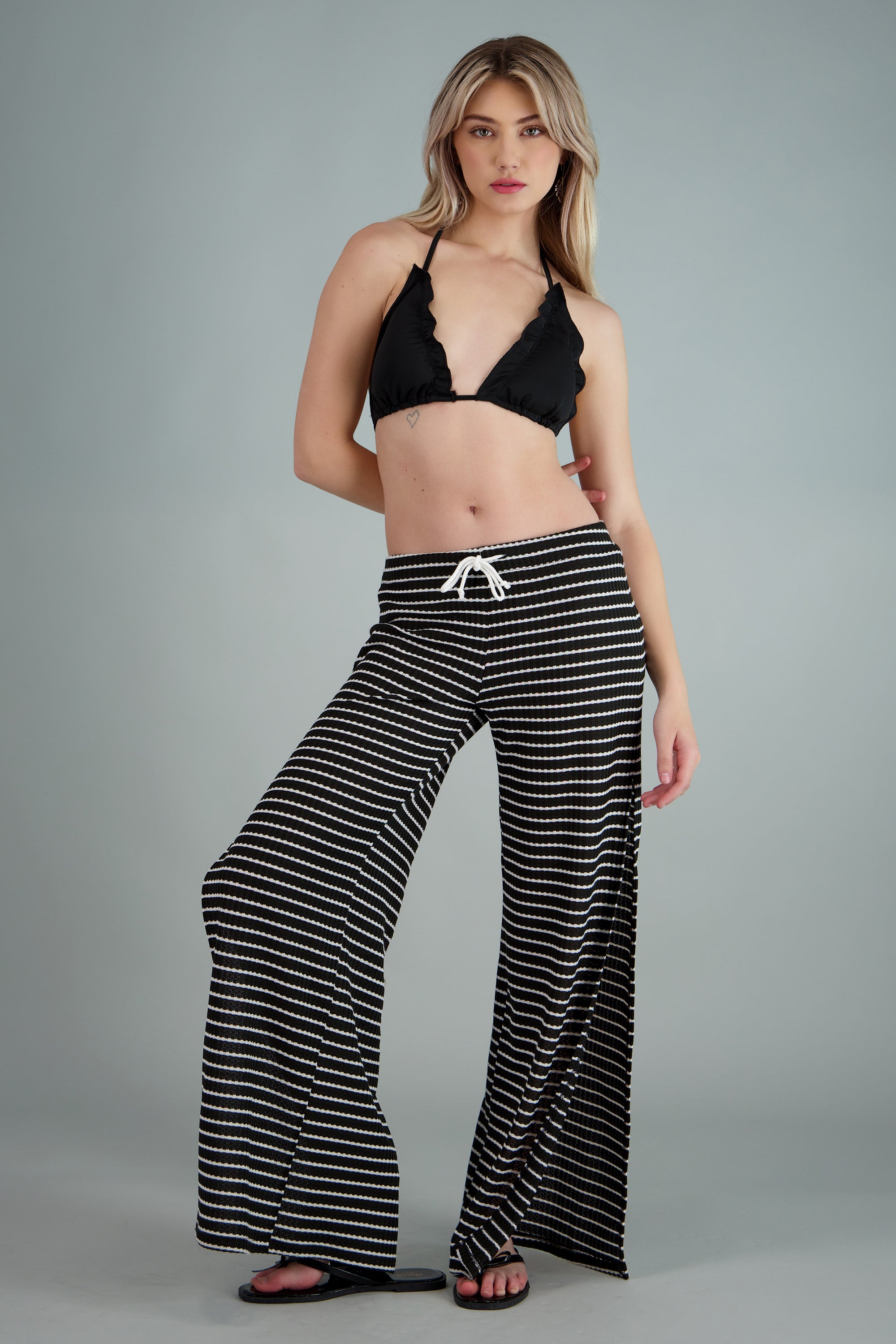 Pantalon textura tejida estampado rayas NEGRO COMBO