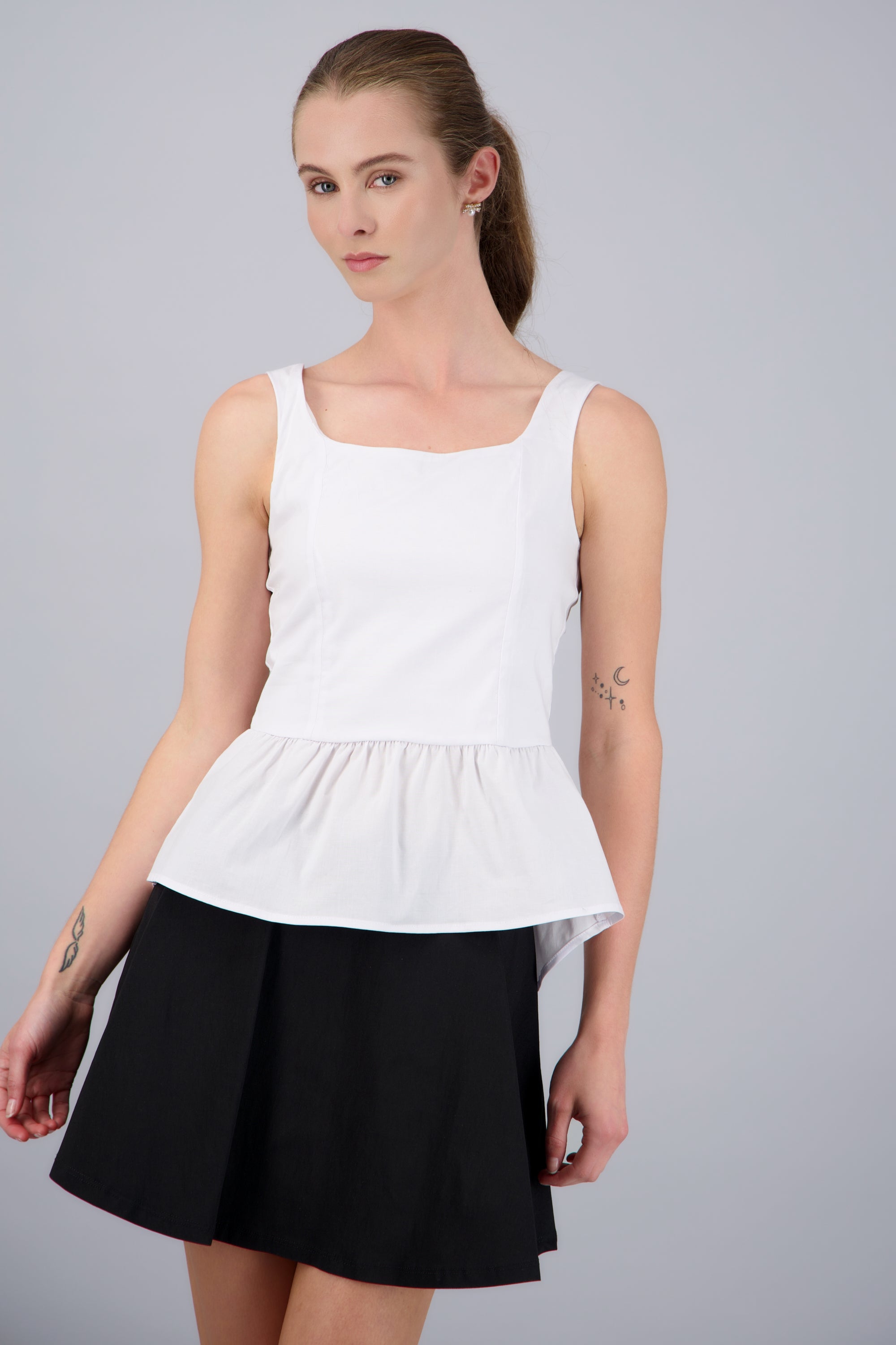 Blusa tirantes detalle peplum BLANCO