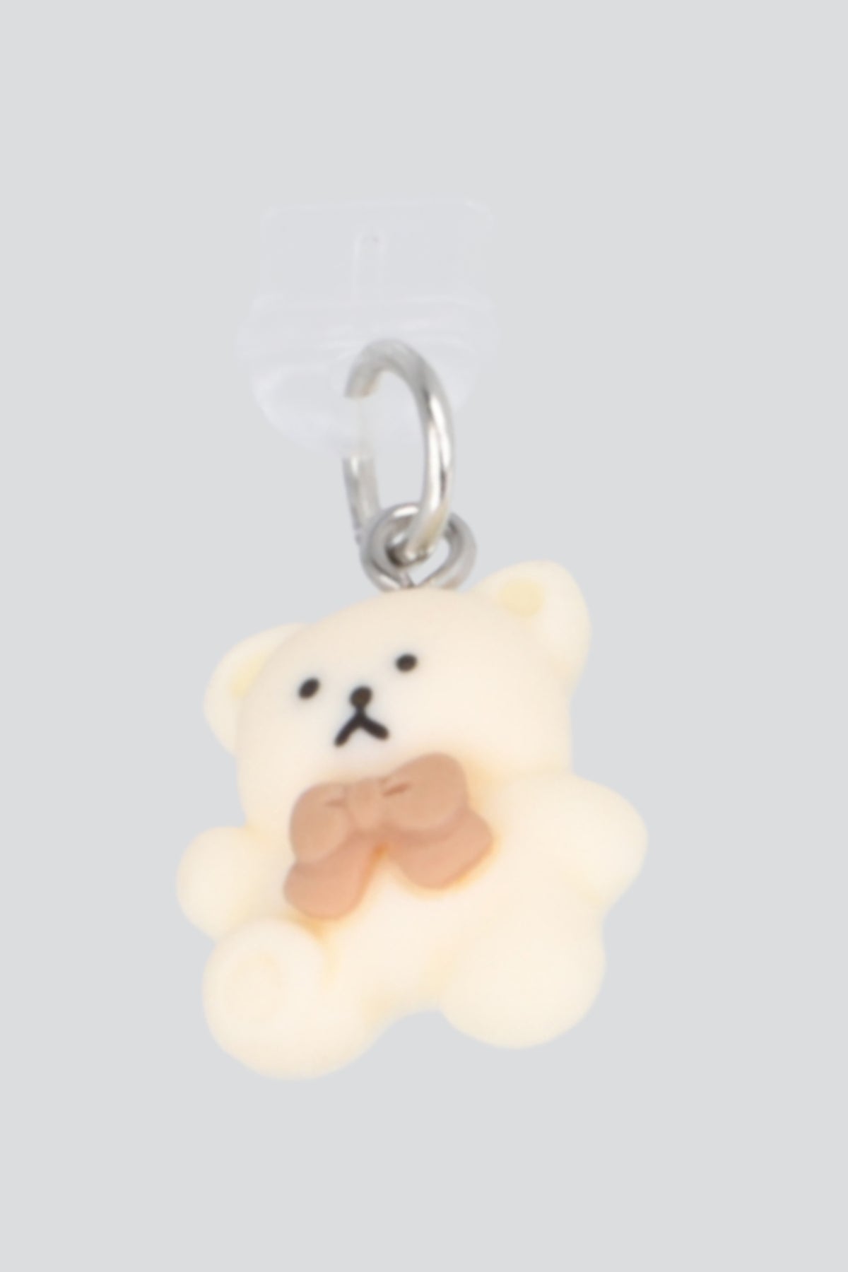 Cel charm oso moño tipo c HUESO