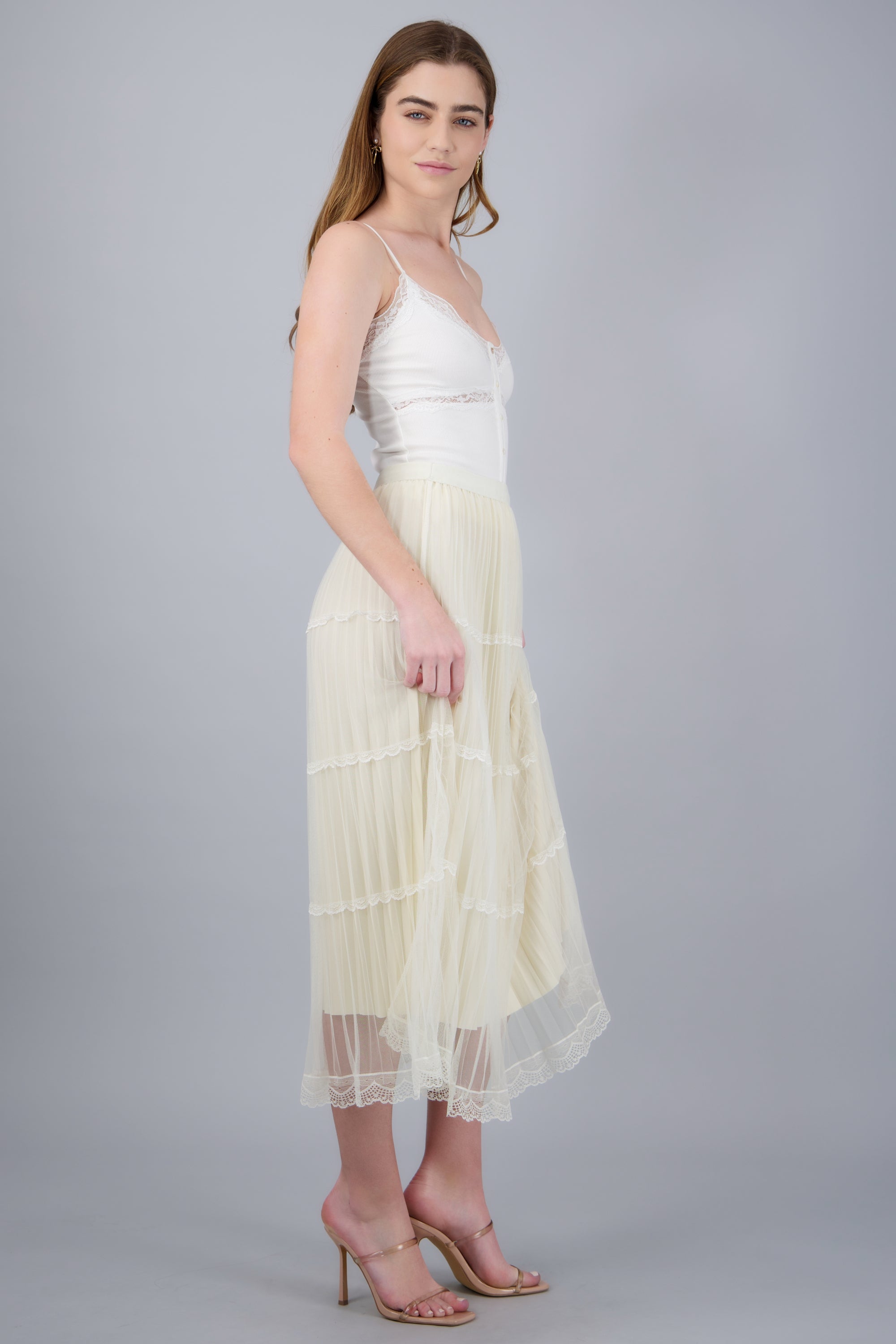 Falda midi cortes plisada CREMA