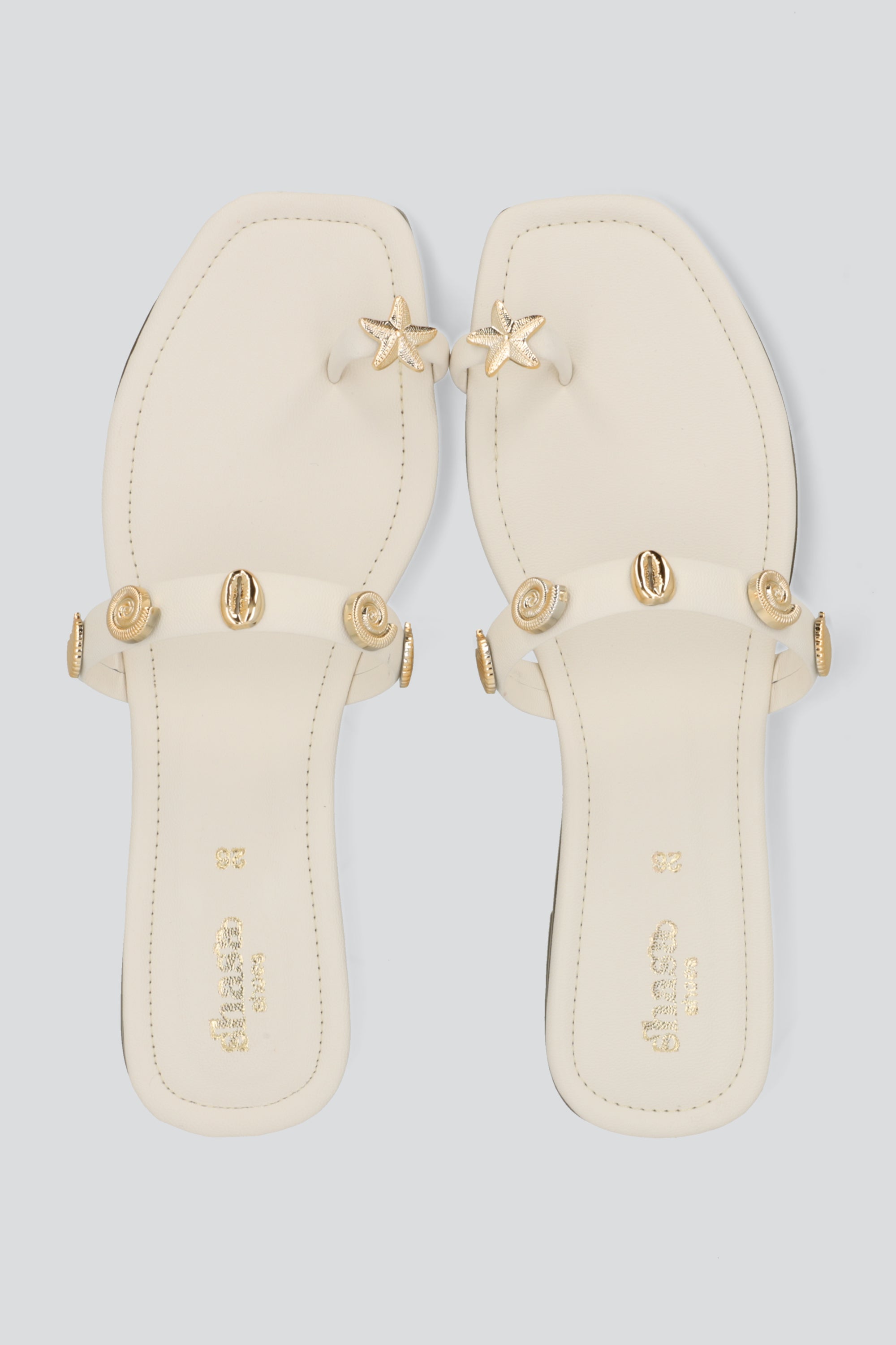 SANDALIA DEDO ESTRELLA MAR HUESO