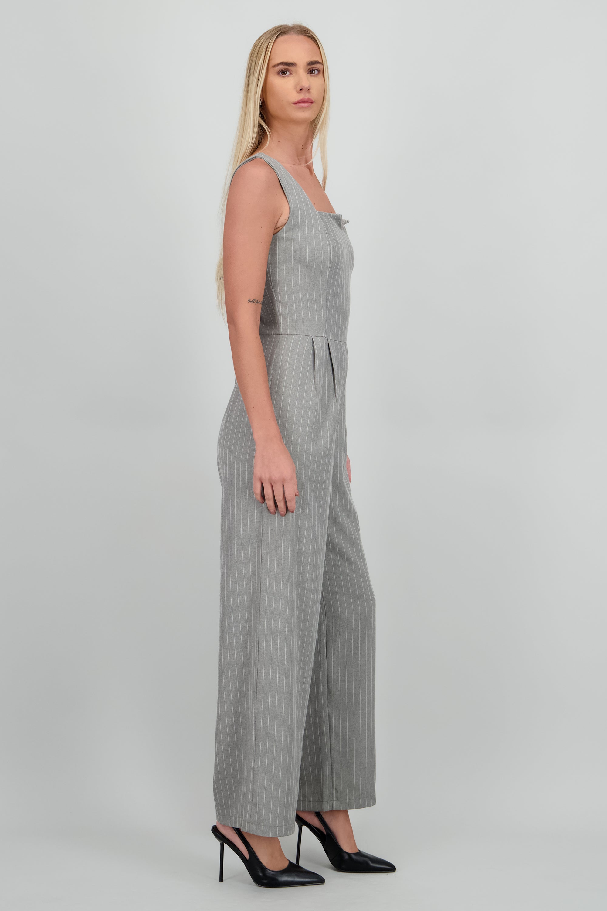 Jumpsuit rayas detalle escote GRIS COMBO
