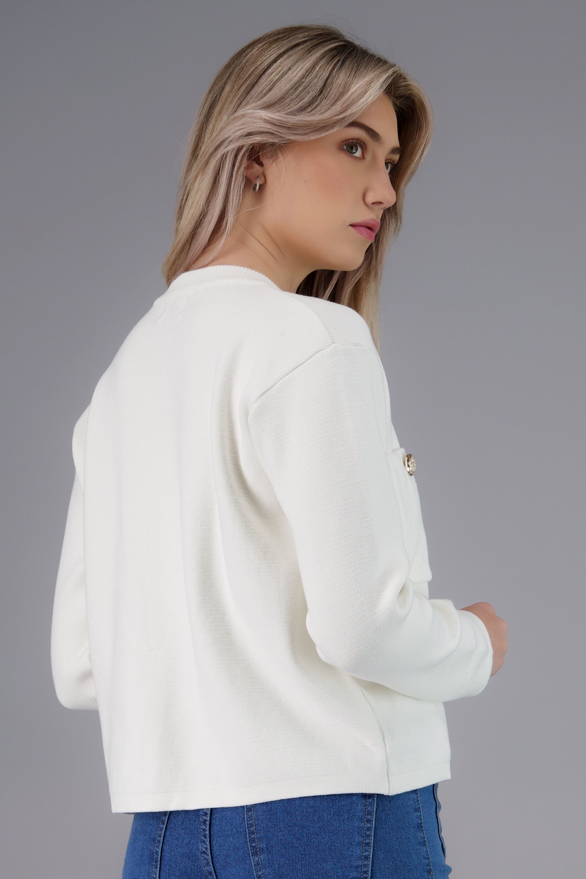 sueter punto liso bolsas CREMA