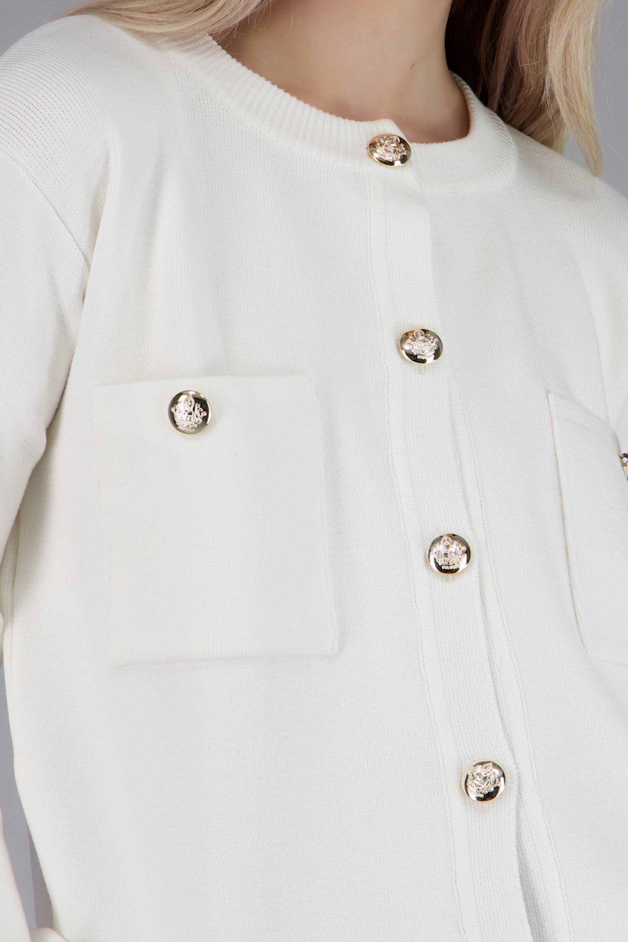 sueter punto liso bolsas CREMA