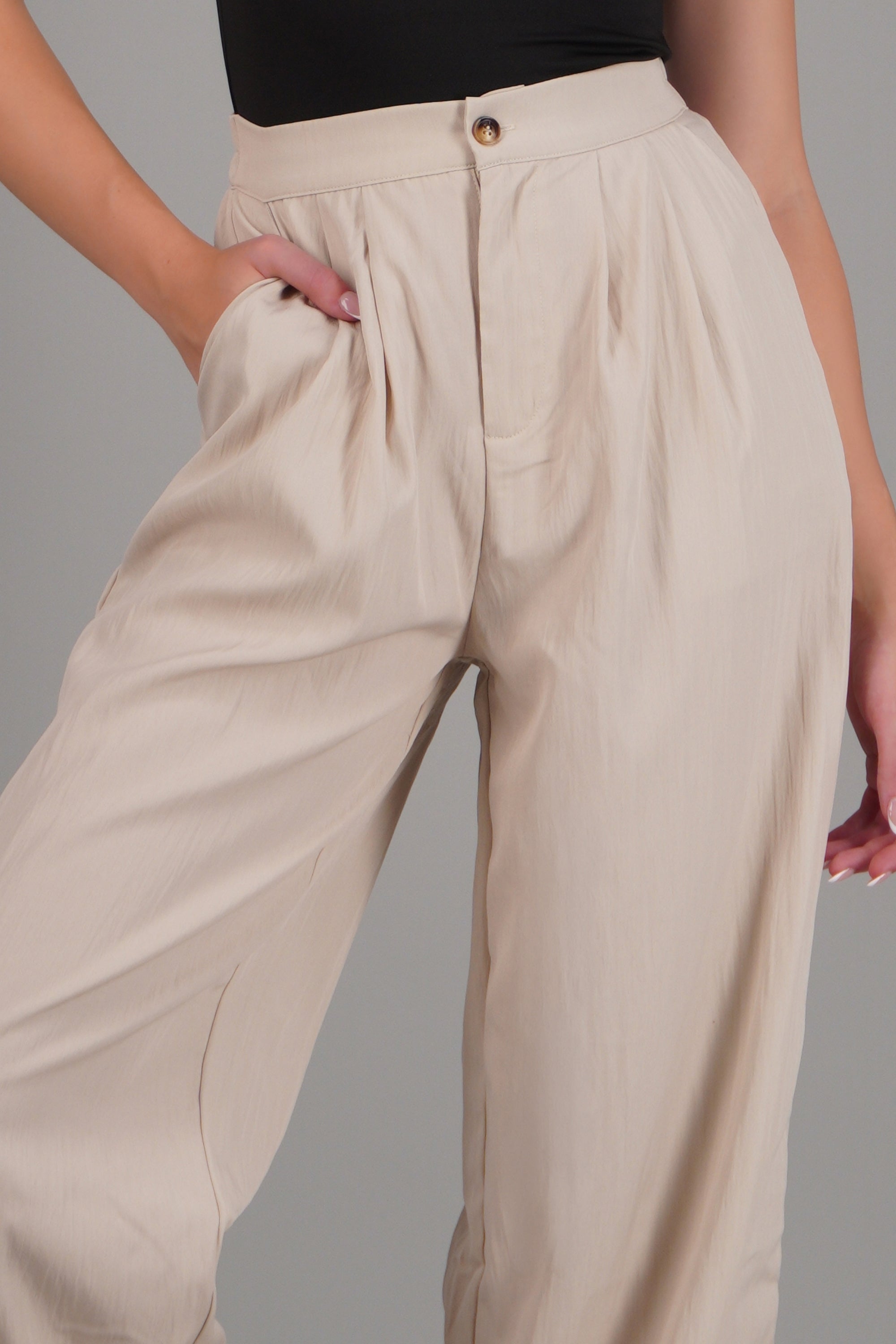 Pantalón wide leg rompevientos GREIGE