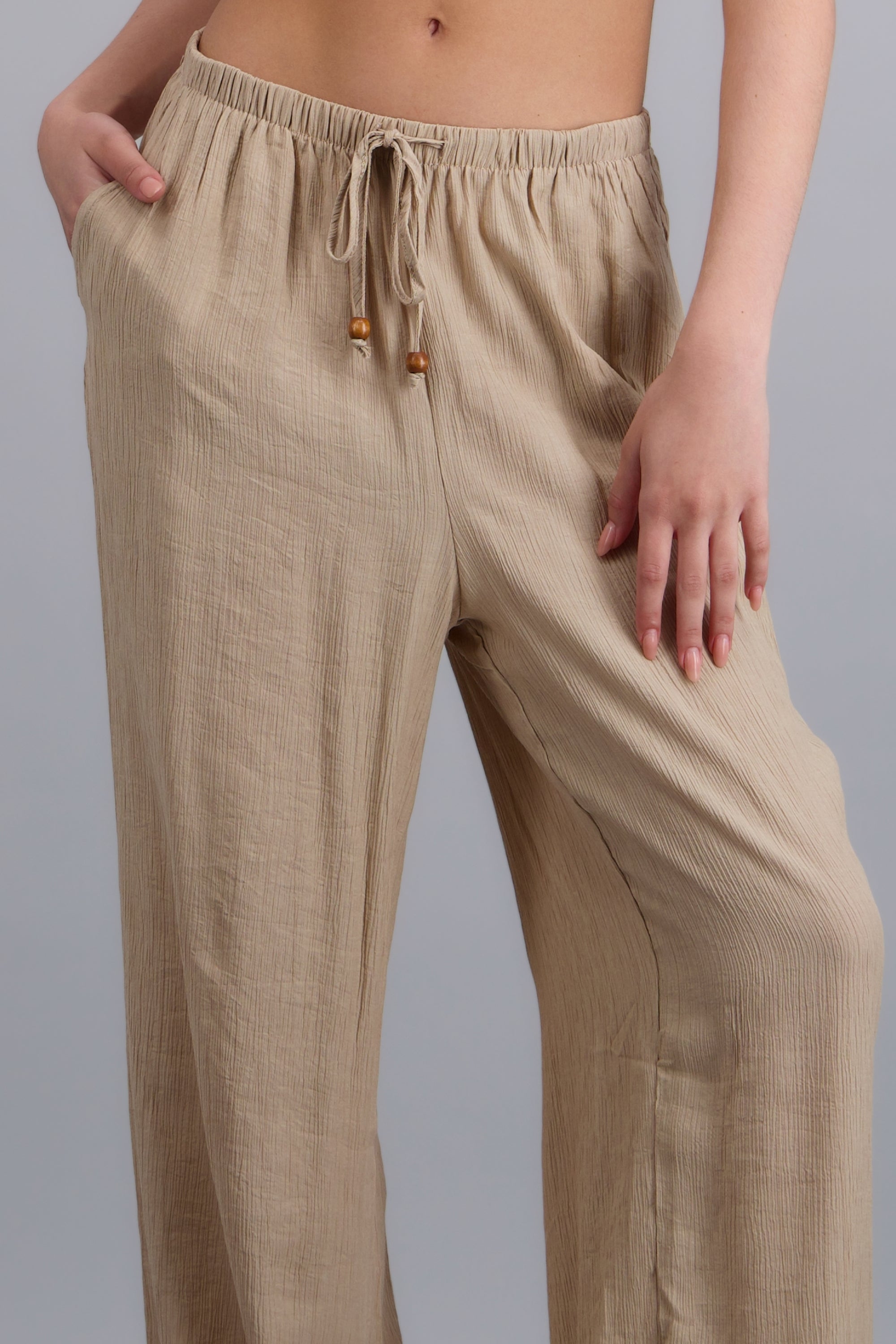 Pantalon amplio jareta detalle cuentas BEIGE