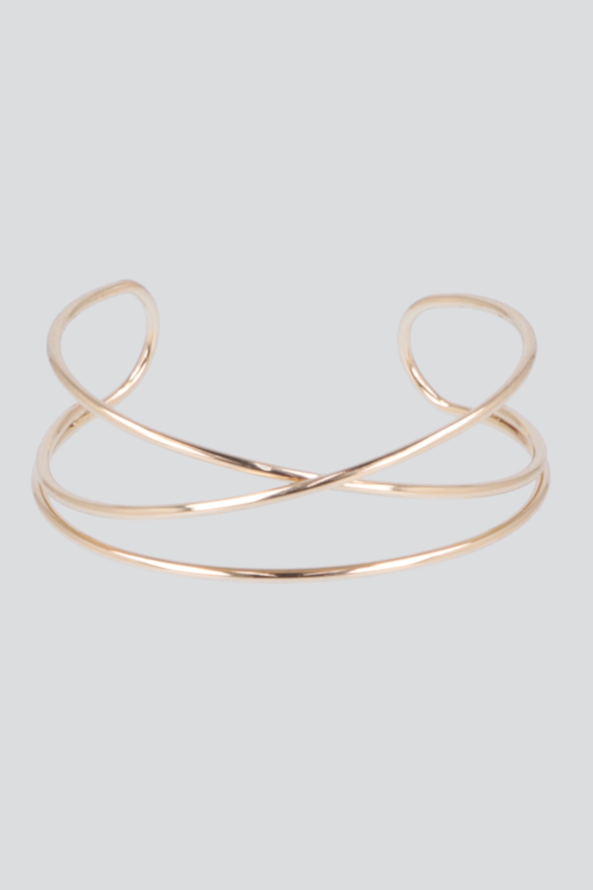 Cuff metal entrelazado ORO