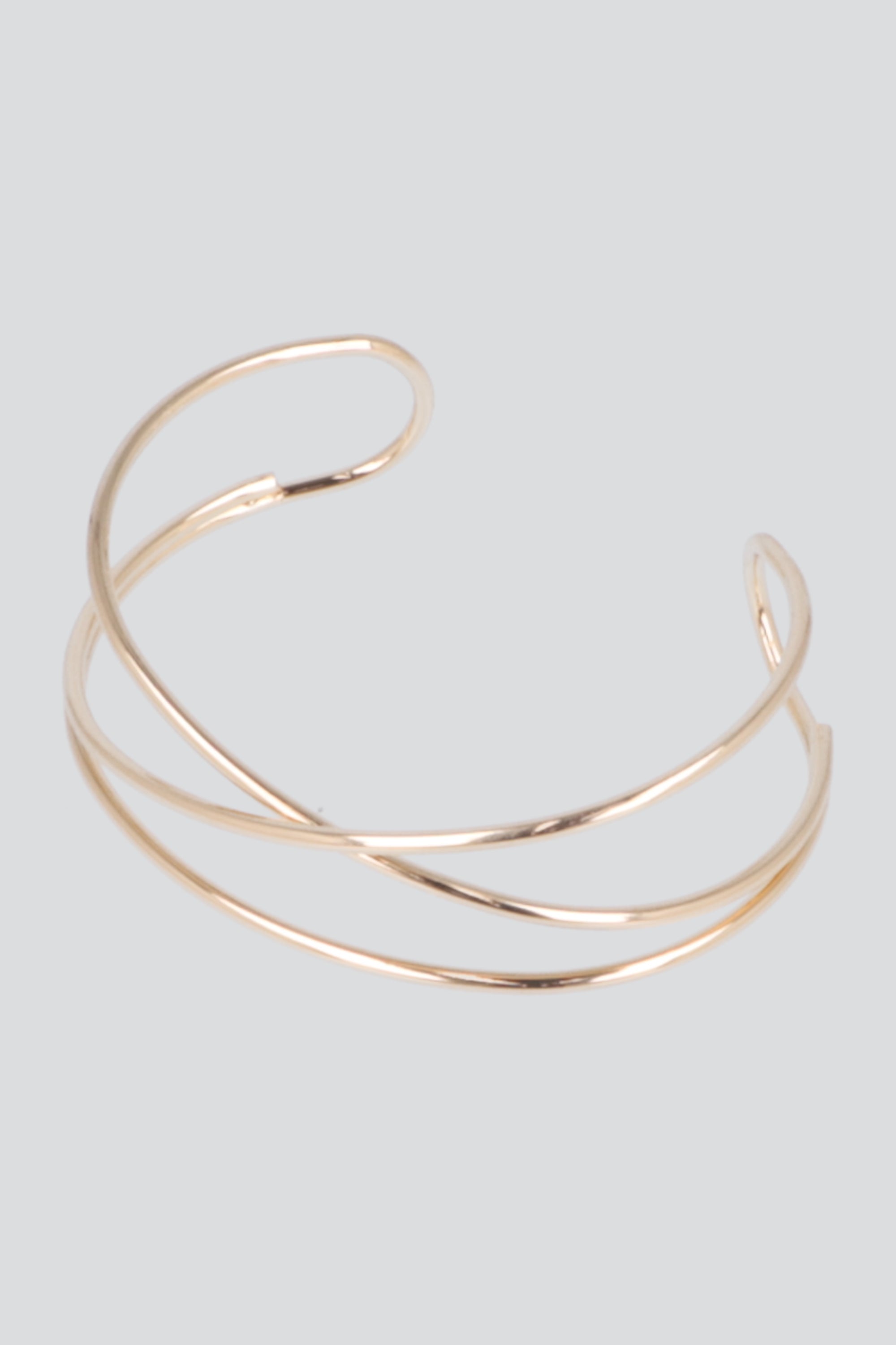 Cuff metal entrelazado ORO