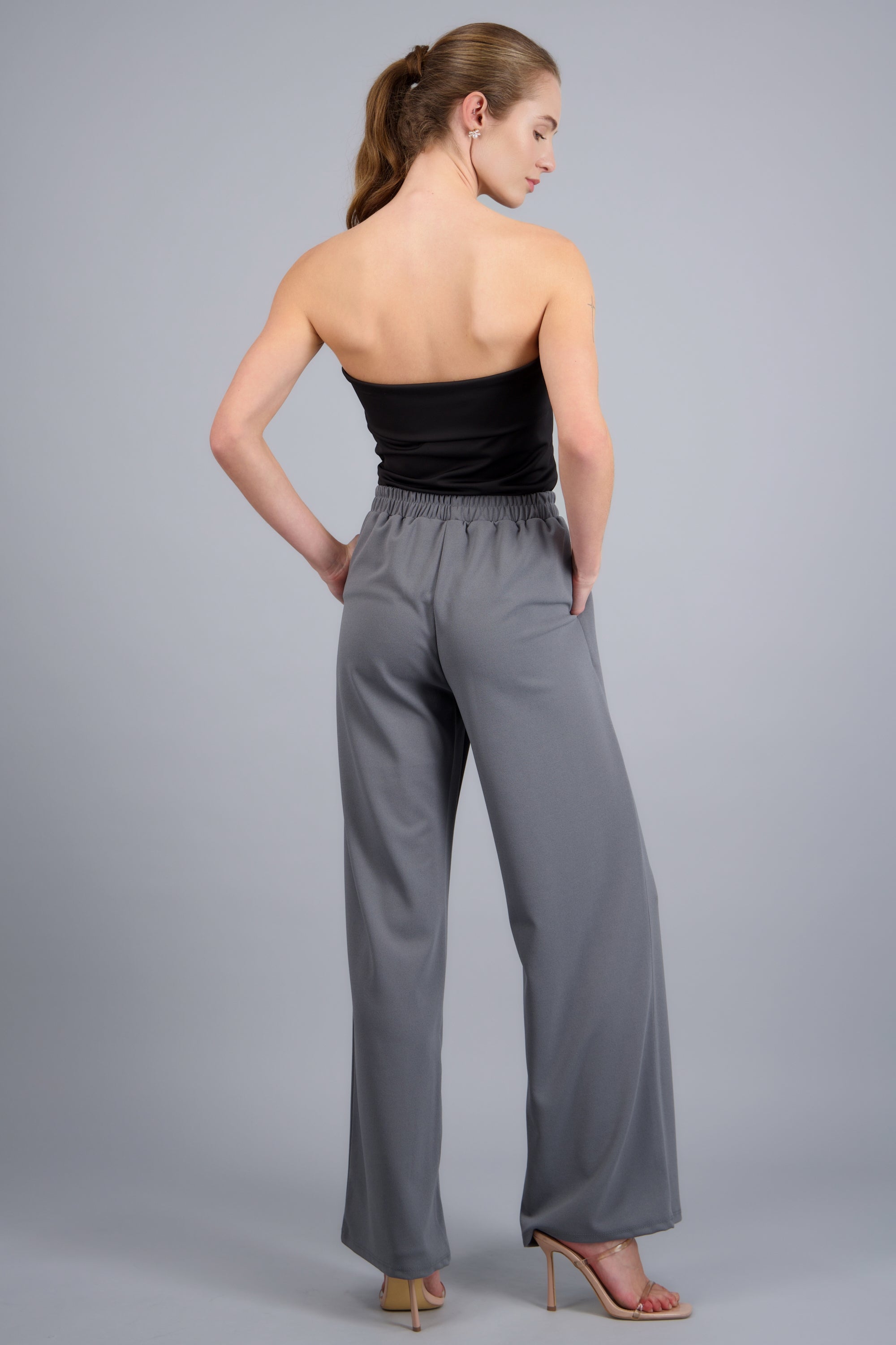 Pantalon fluido detalle resorte GRIS