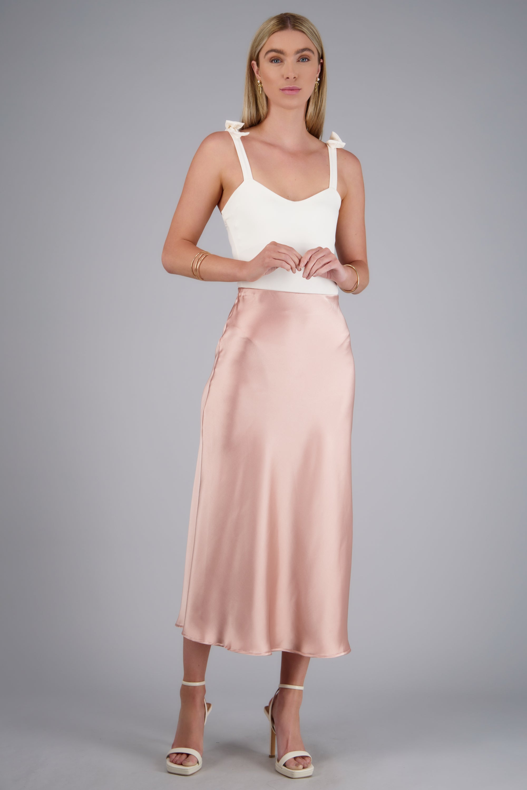 Falda midi satinada lisa ROSA PASTEL