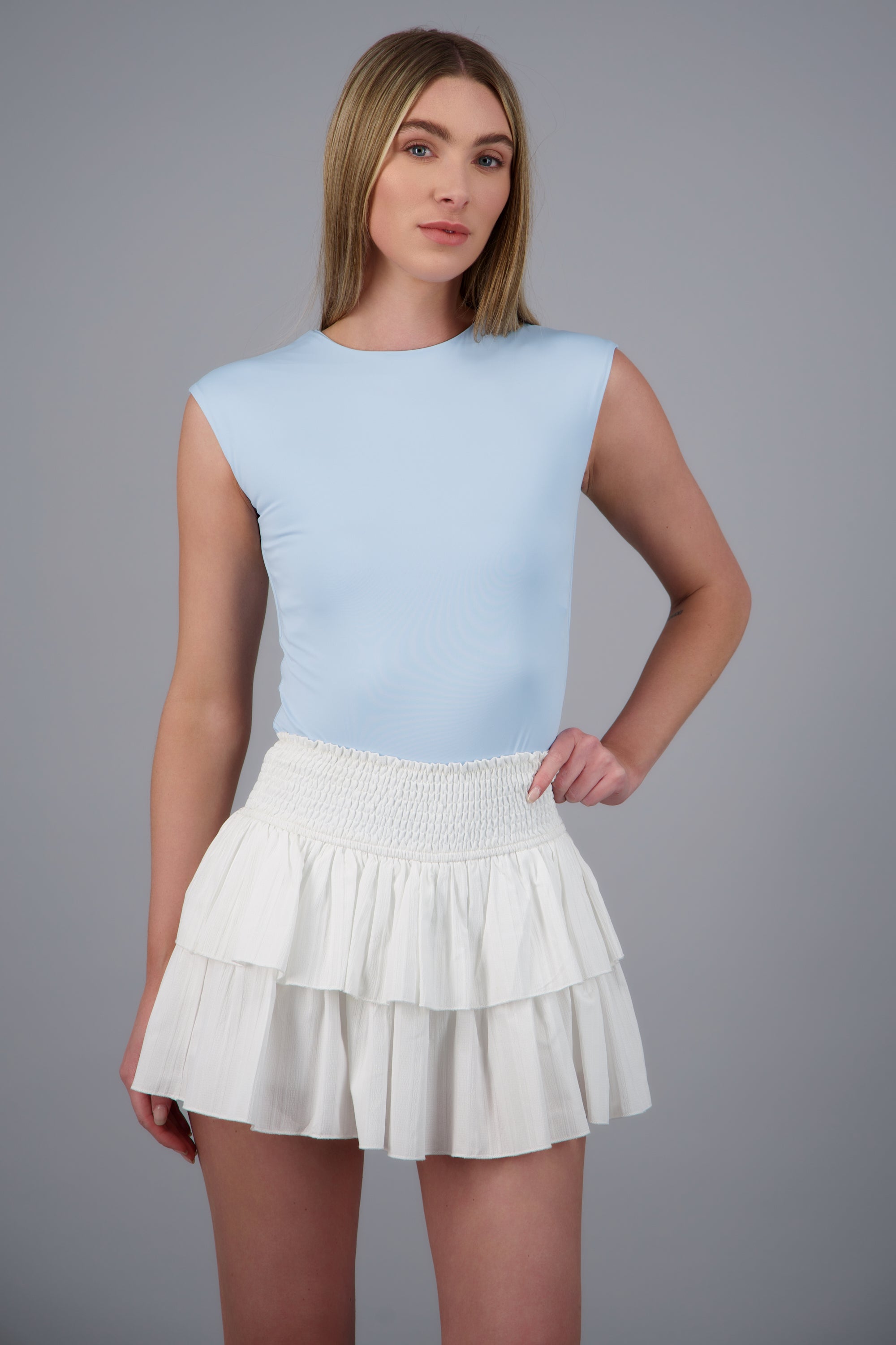 Body cuello redondo sin manga AZUL CIELO