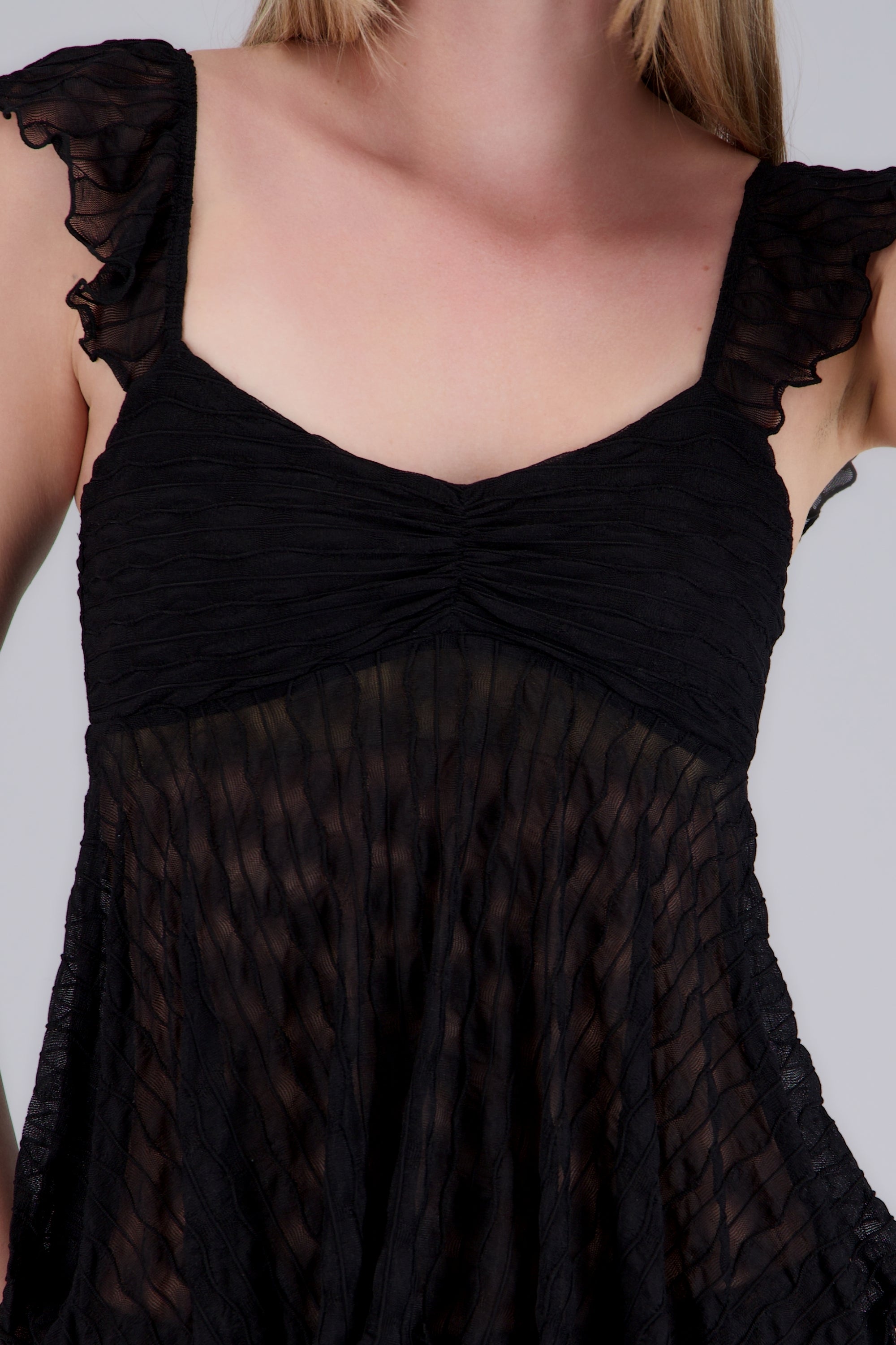 Blusa sin manga asimétrica textura NEGRO
