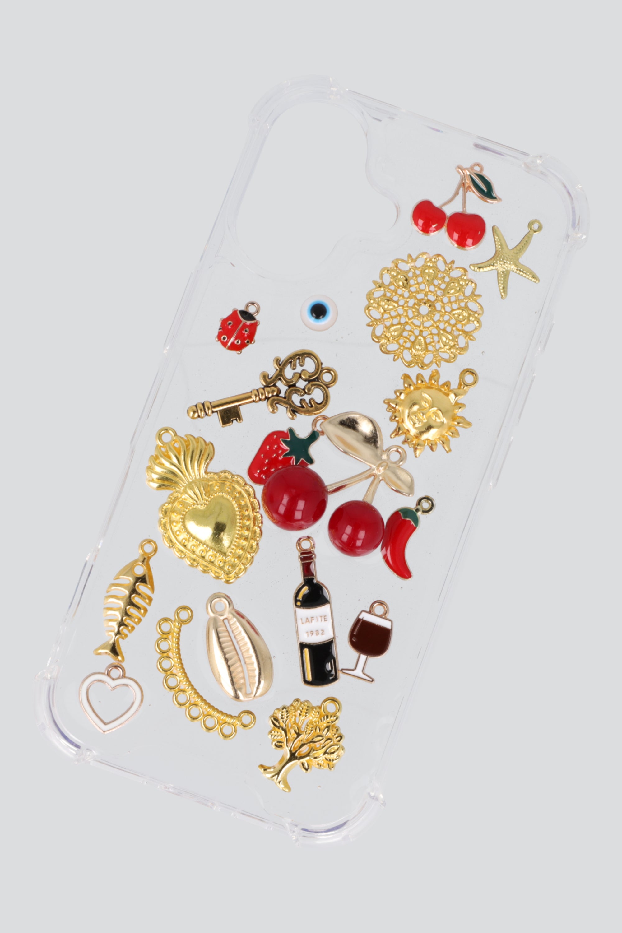 Funda iph 17 multicharms ORO