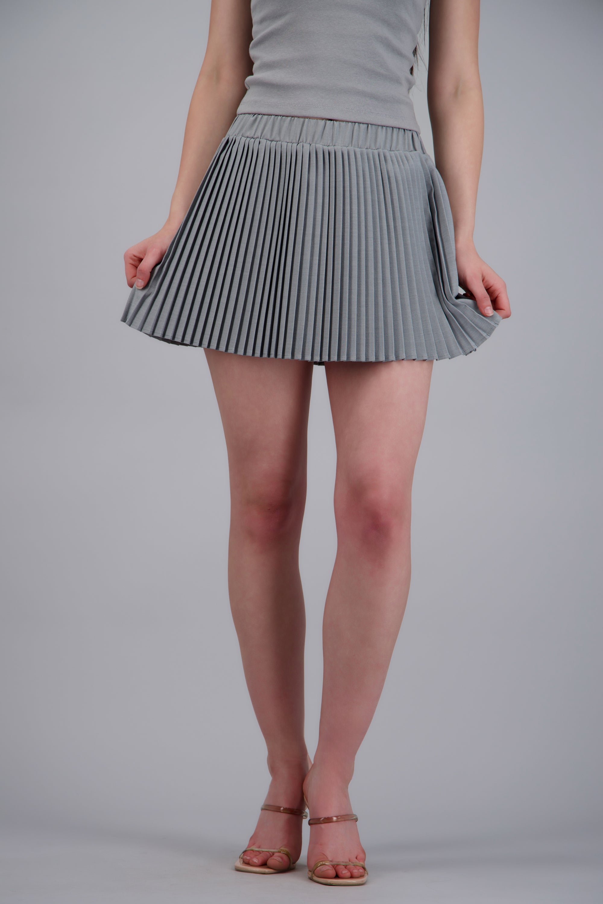 Falda mini plisada con elastico GRIS