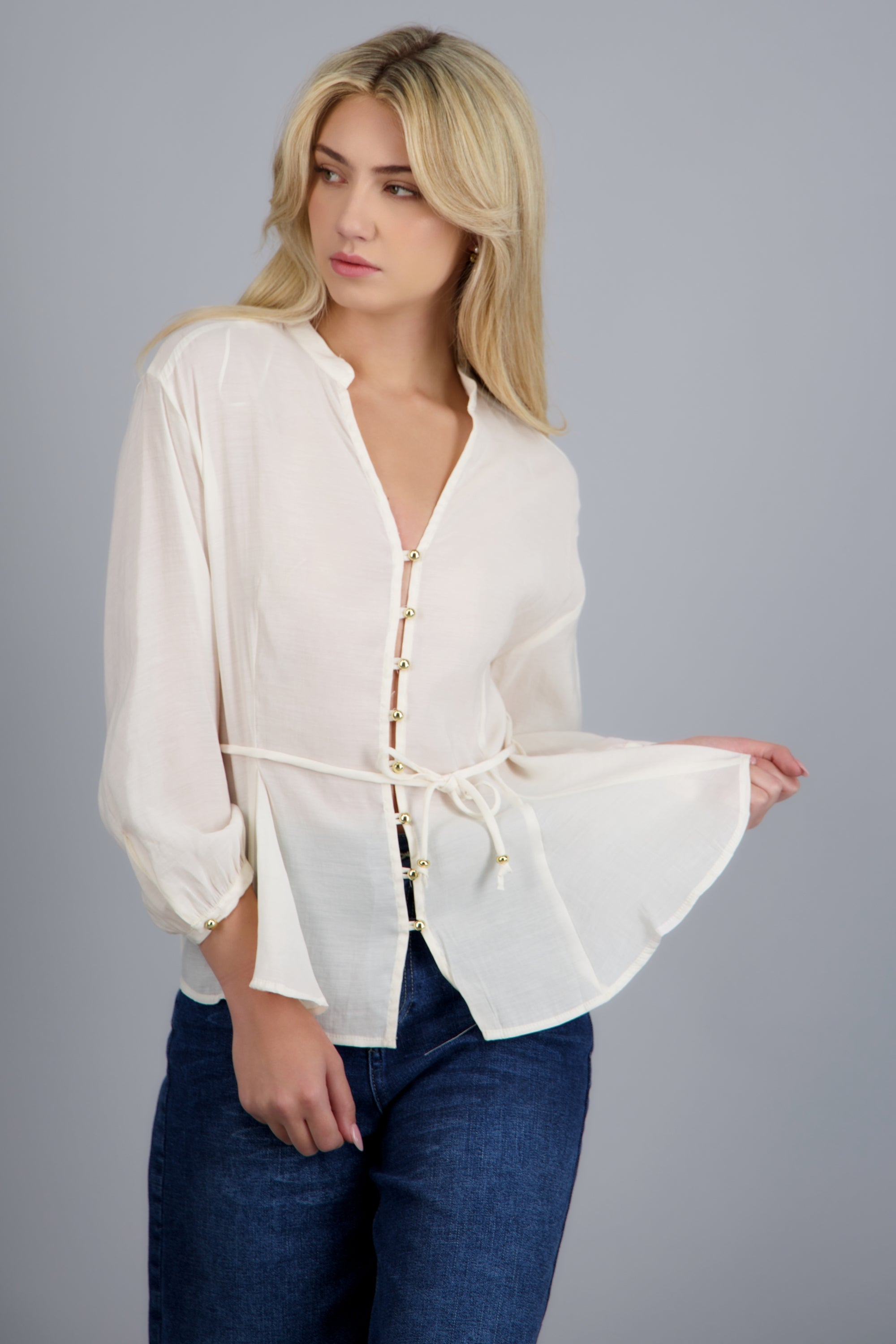 Blusa fluida detalle cituron manga larga CREMA